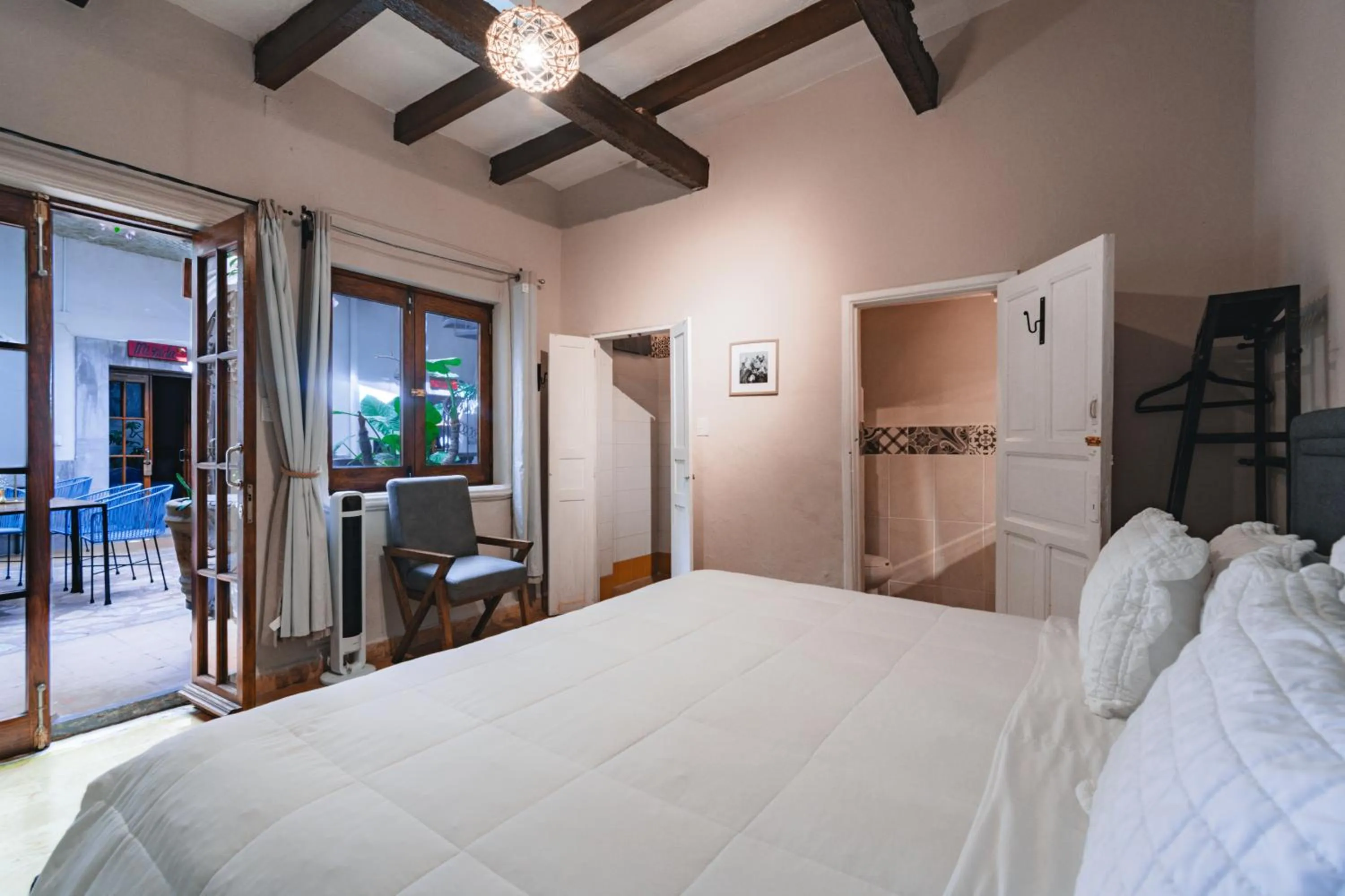 Photo of the whole room, Bed in Te Amo Hotel Boutique