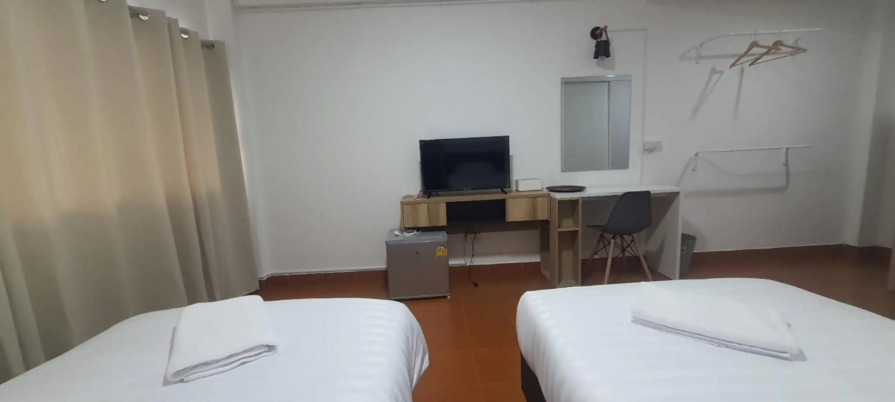 Bed in Ratanasiri Hotel