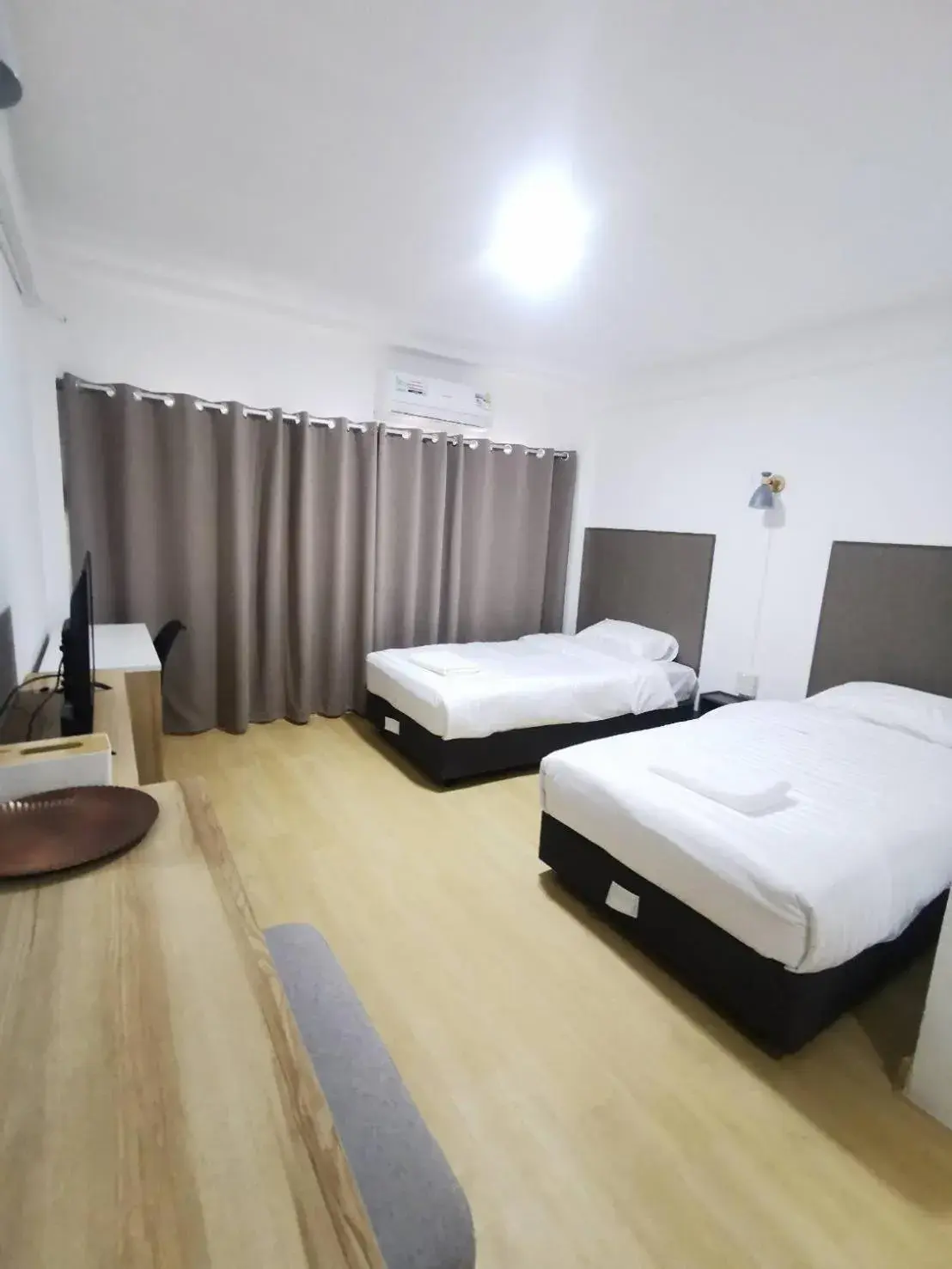 Bed in Ratanasiri Hotel Bed in Ratanasiri Hotel