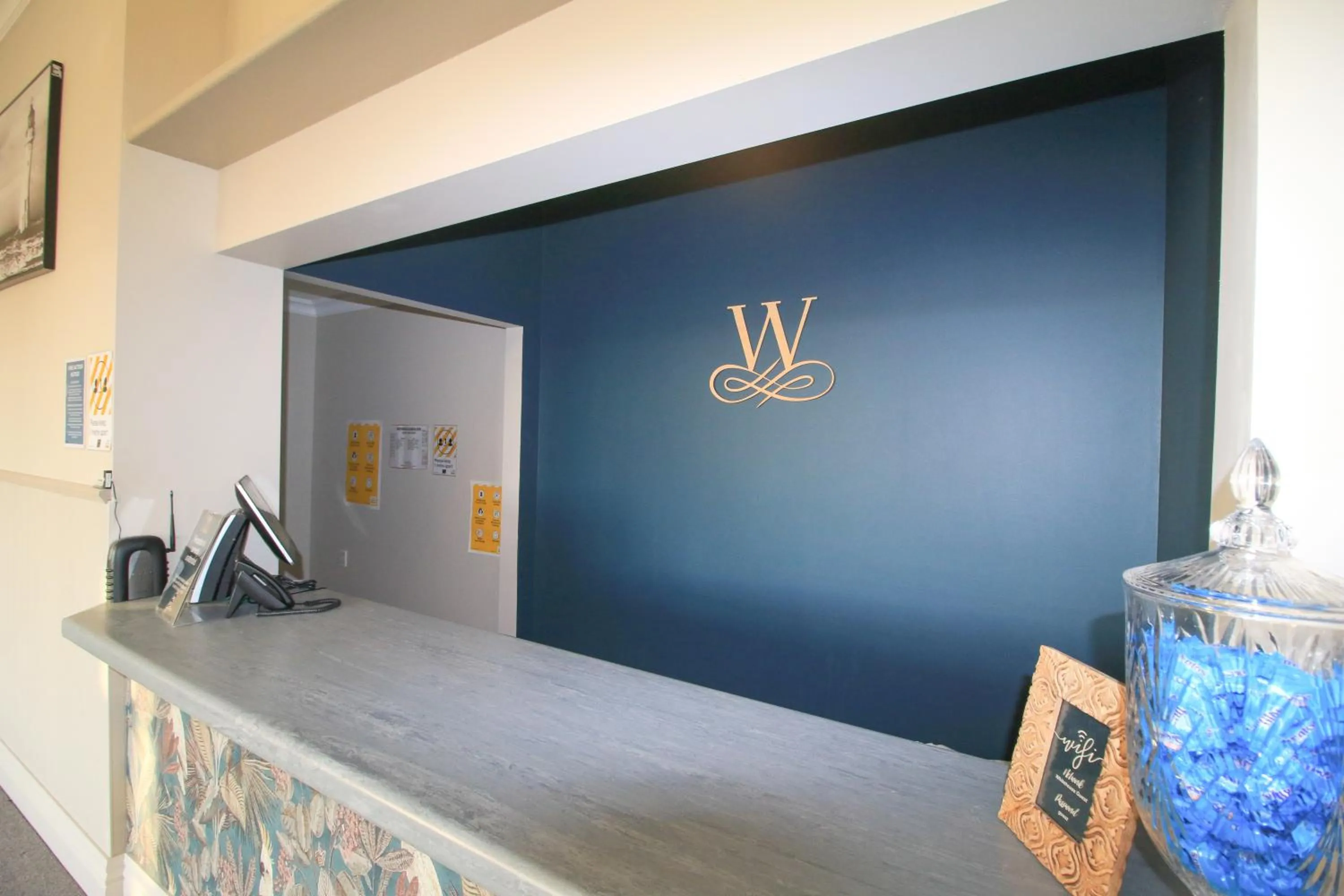 Property logo or sign in Whitehouse Hotel