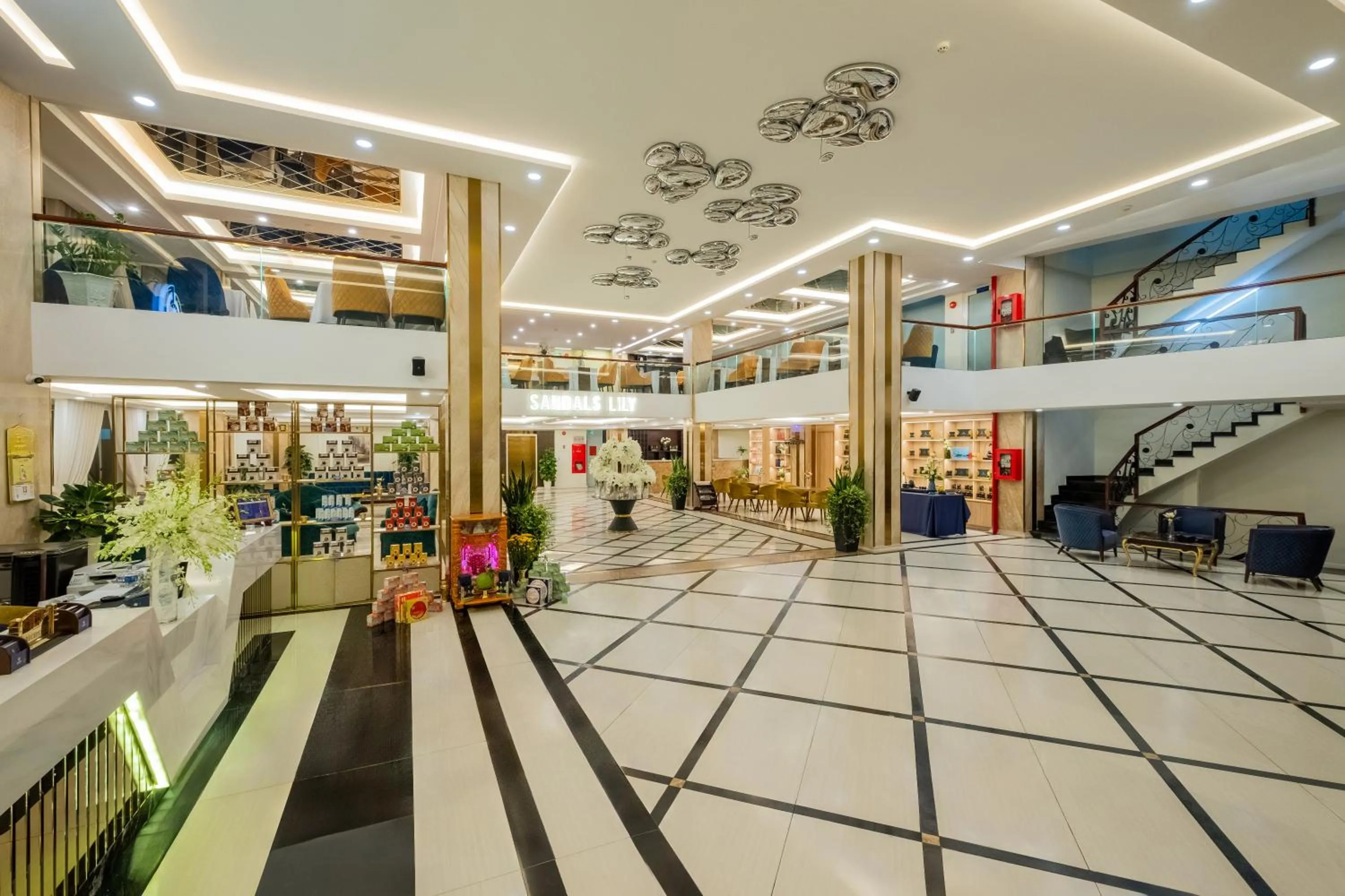 Communal lounge/ TV room in Sandals Lily Hotel