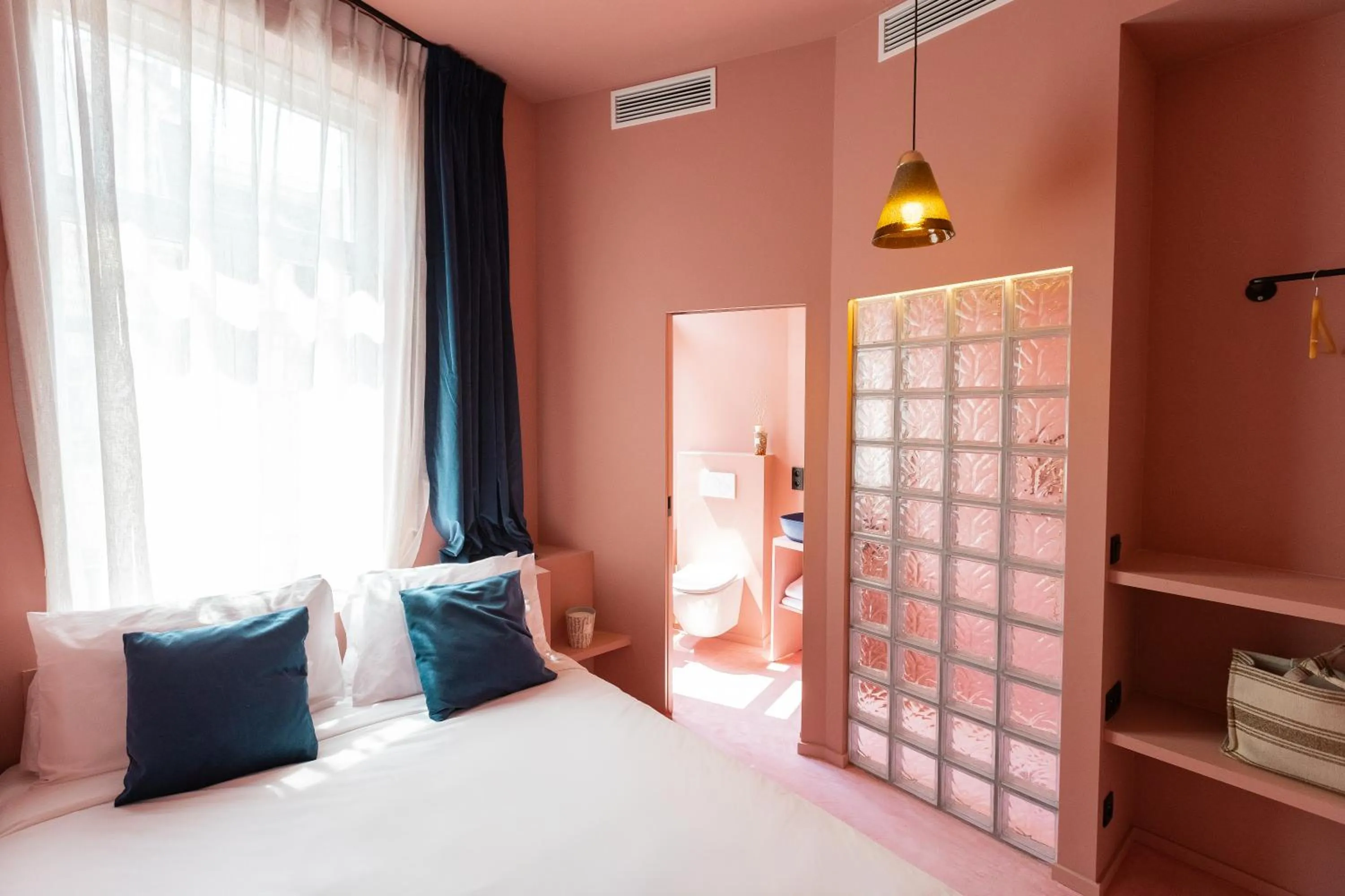 Bed in The Mila Hotel