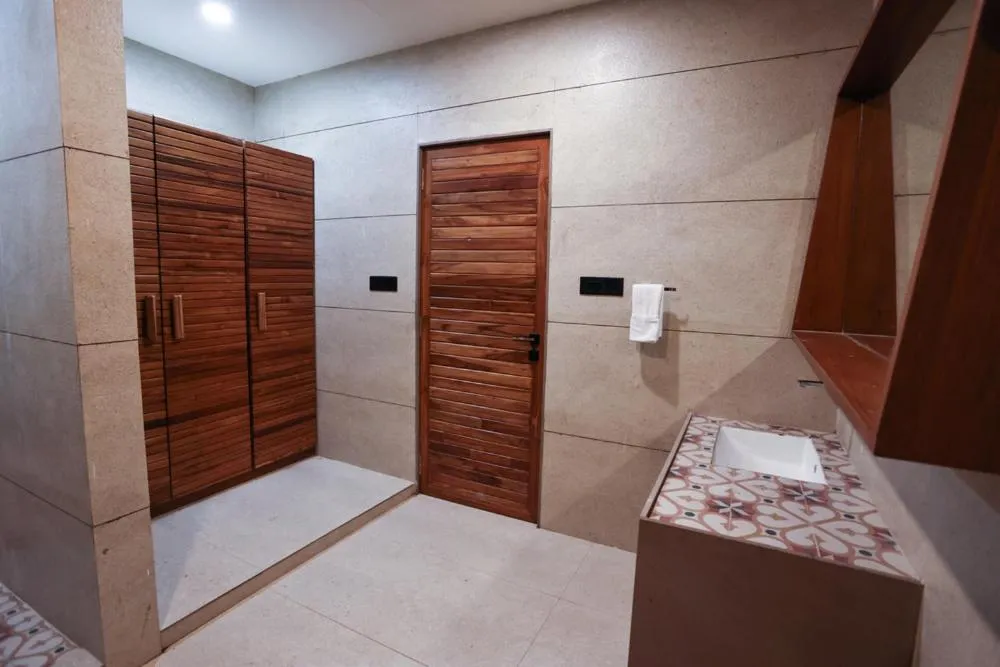 Bathroom in Le Casa Lion Resort A Premium Resort In Sasan Gir