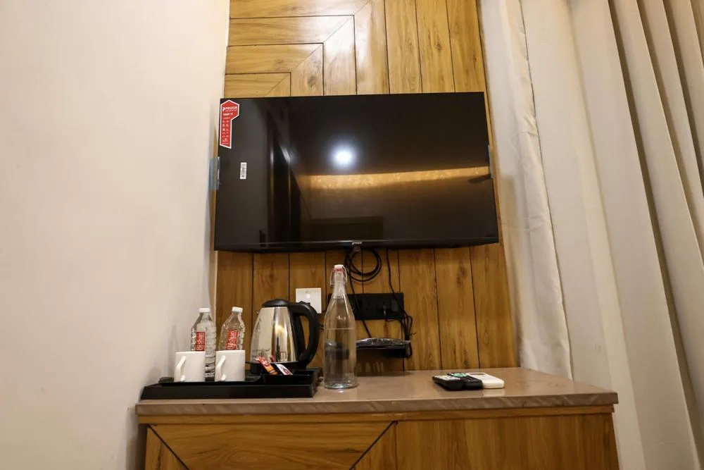 TV and multimedia in Le Casa Lion Resort A Premium Resort In Sasan Gir