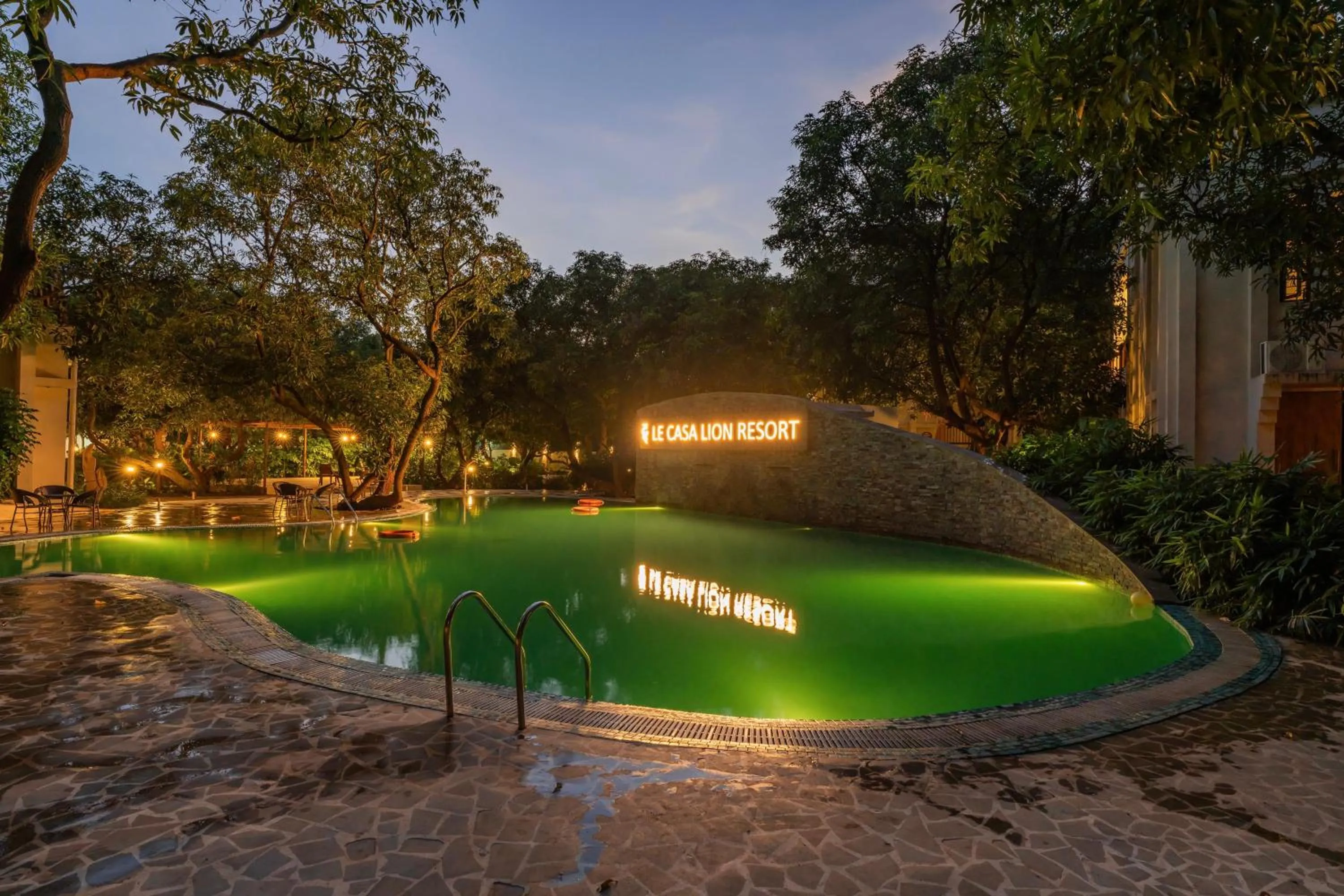 Swimming pool in Le Casa Lion Resort A Premium Resort In Sasan Gir