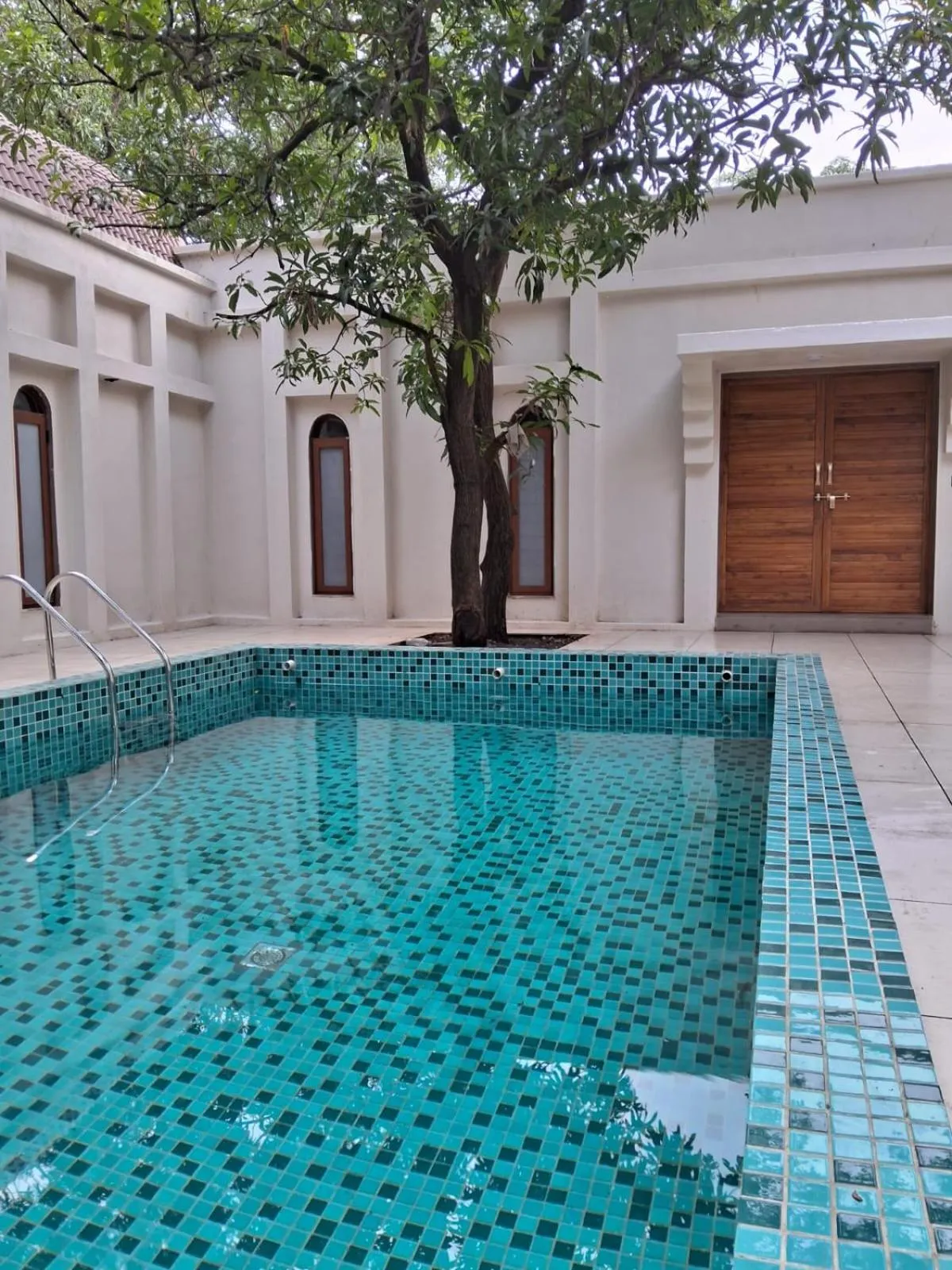 Swimming pool in Le Casa Lion Resort A Premium Resort In Sasan Gir