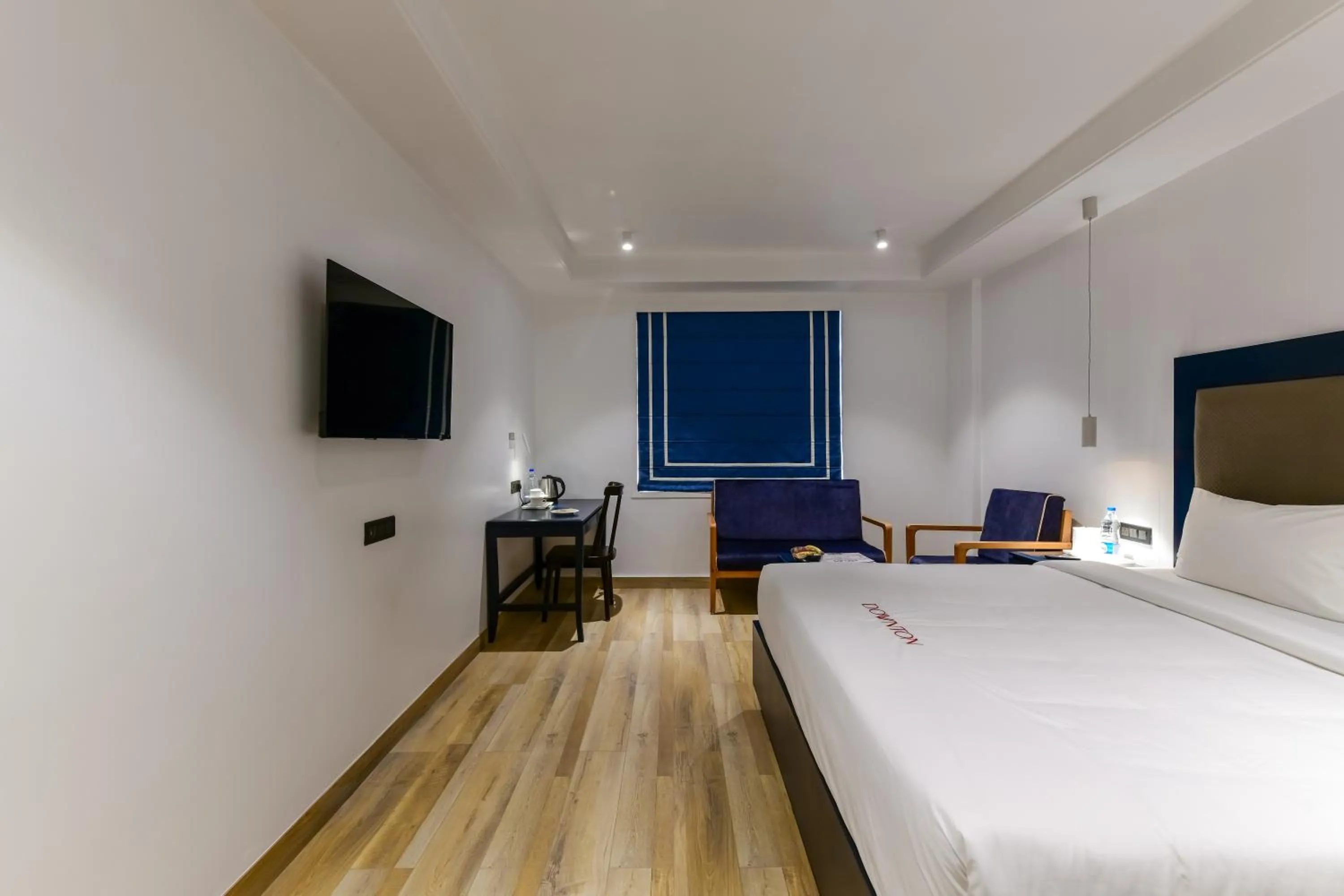 Photo of the whole room, Bed in Regenta Inn Downton Raipur