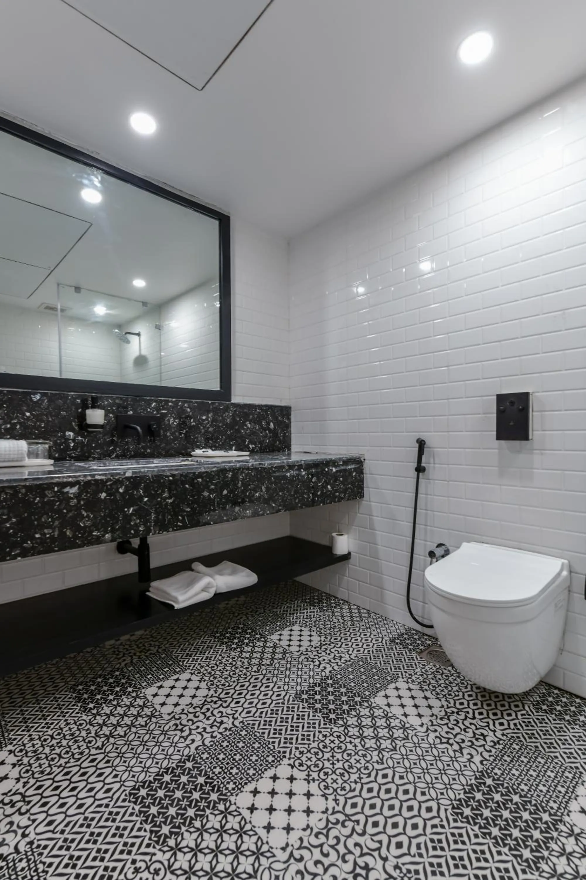 Toilet in Regenta Inn Downton Raipur