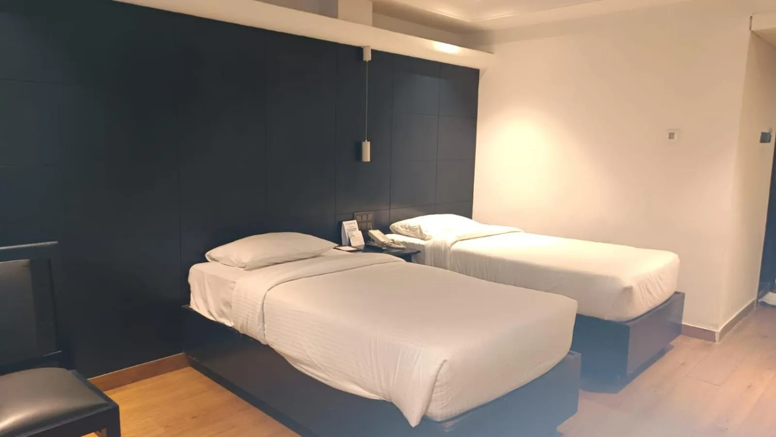 Bedroom, Bed in Regenta Inn Downton Raipur