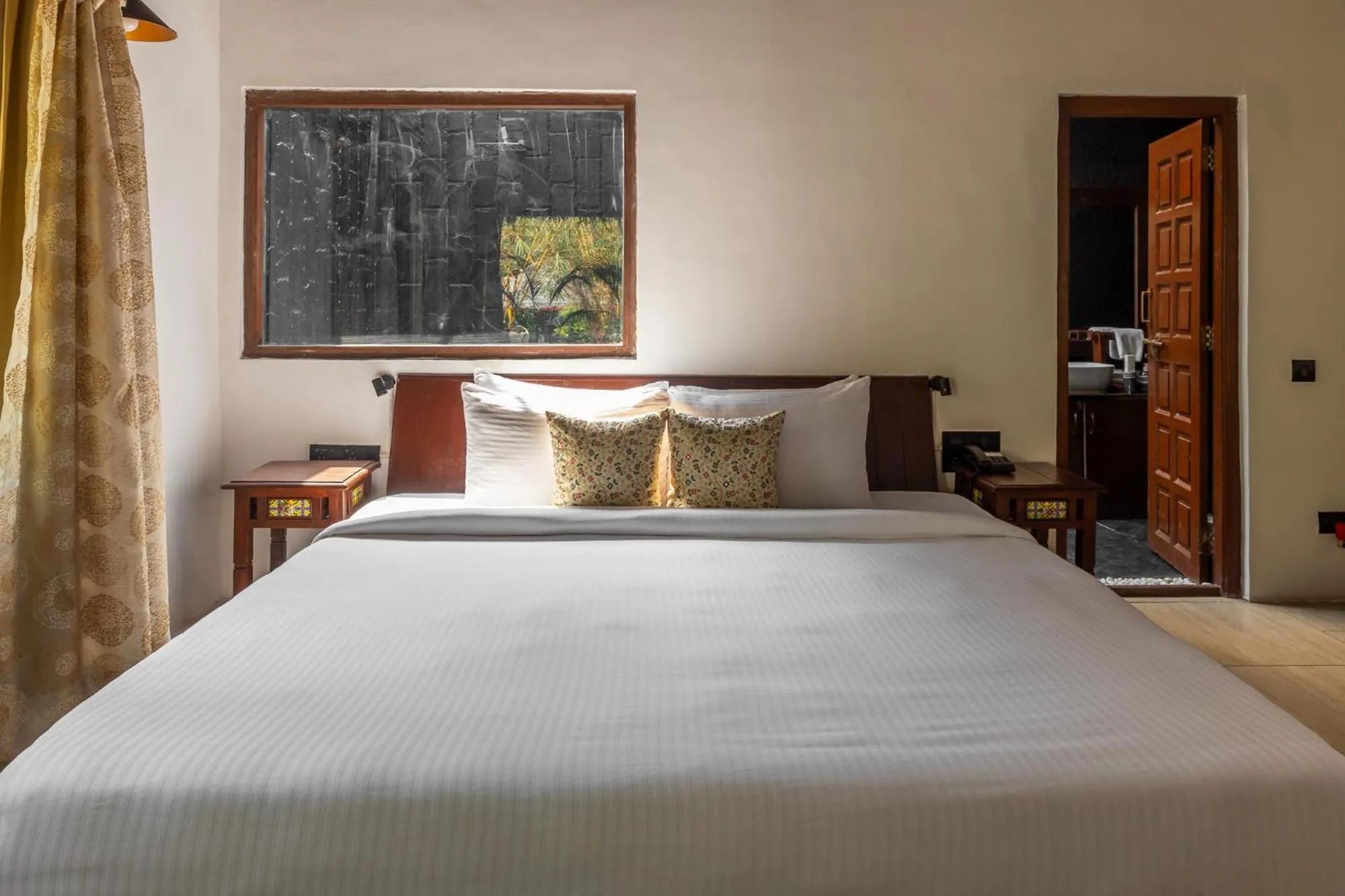 Bed in WilderNest Araanya by Vibescapes