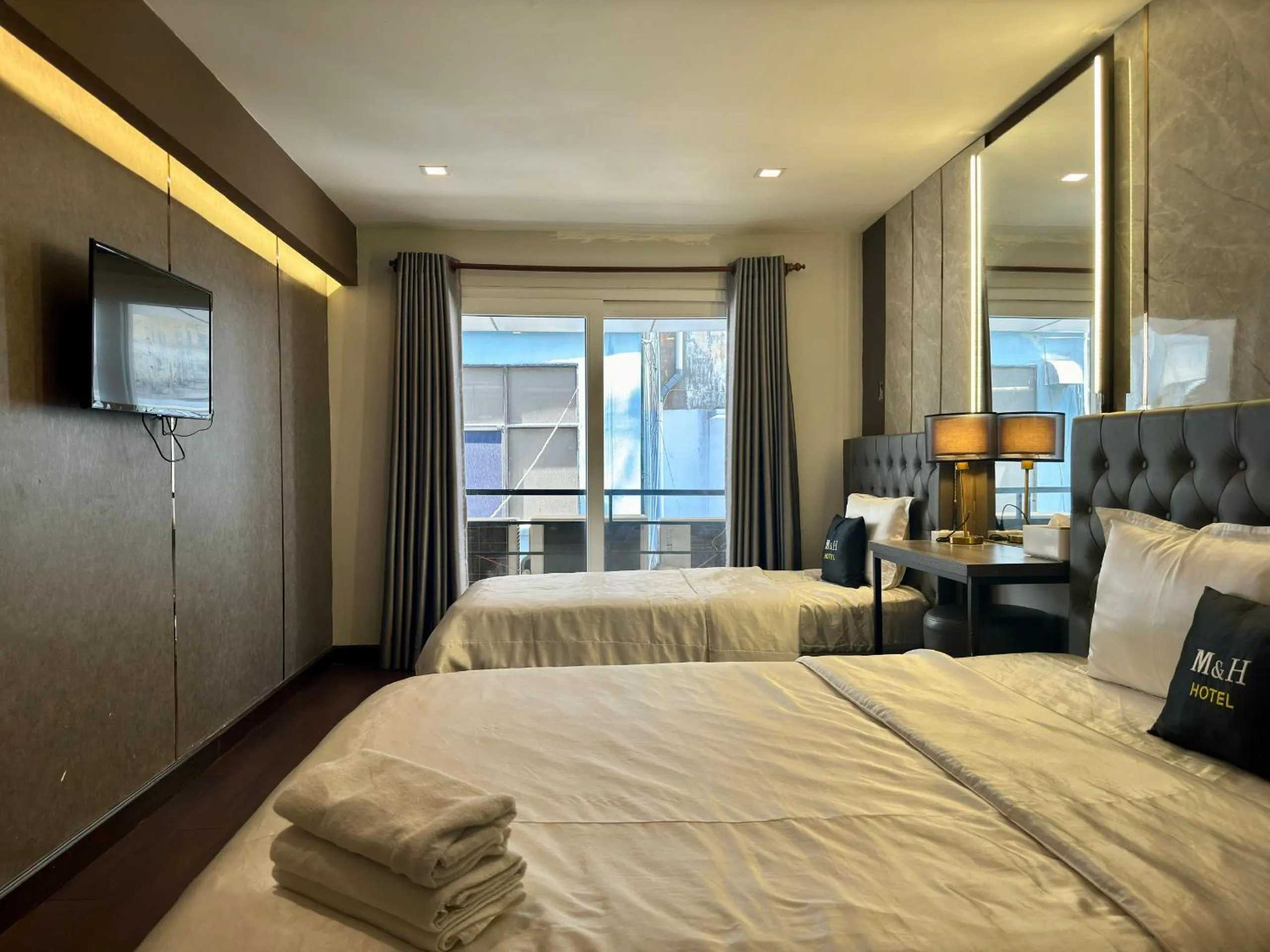 Photo of the whole room, Bed in M&H Lux Hotel
