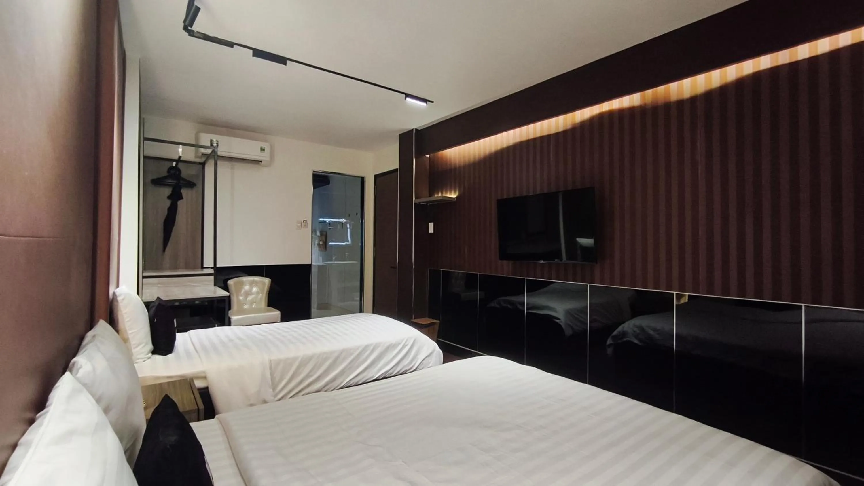 Bed in M&H Lux Hotel