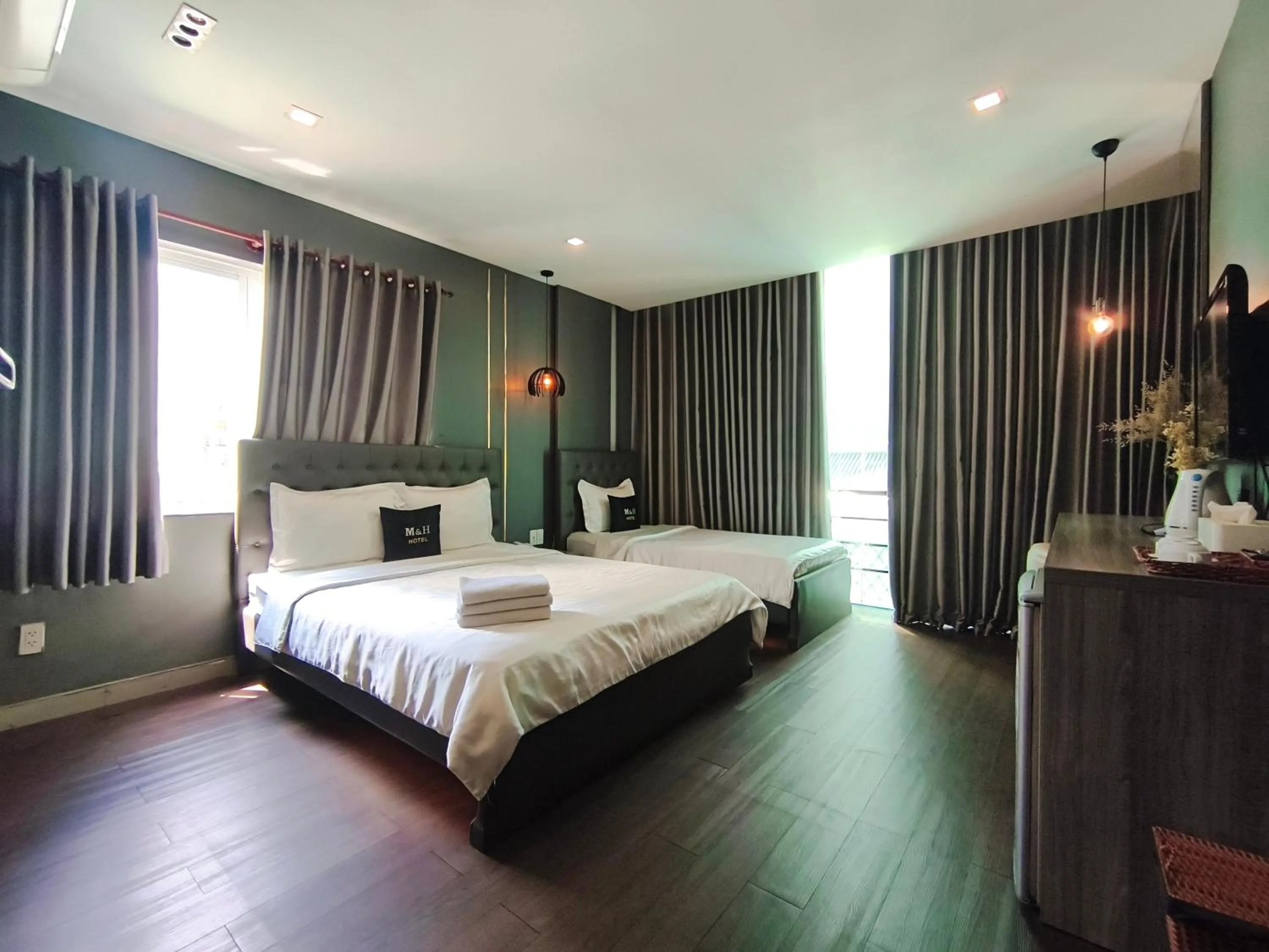 Photo of the whole room, Bed in M&H Lux Hotel