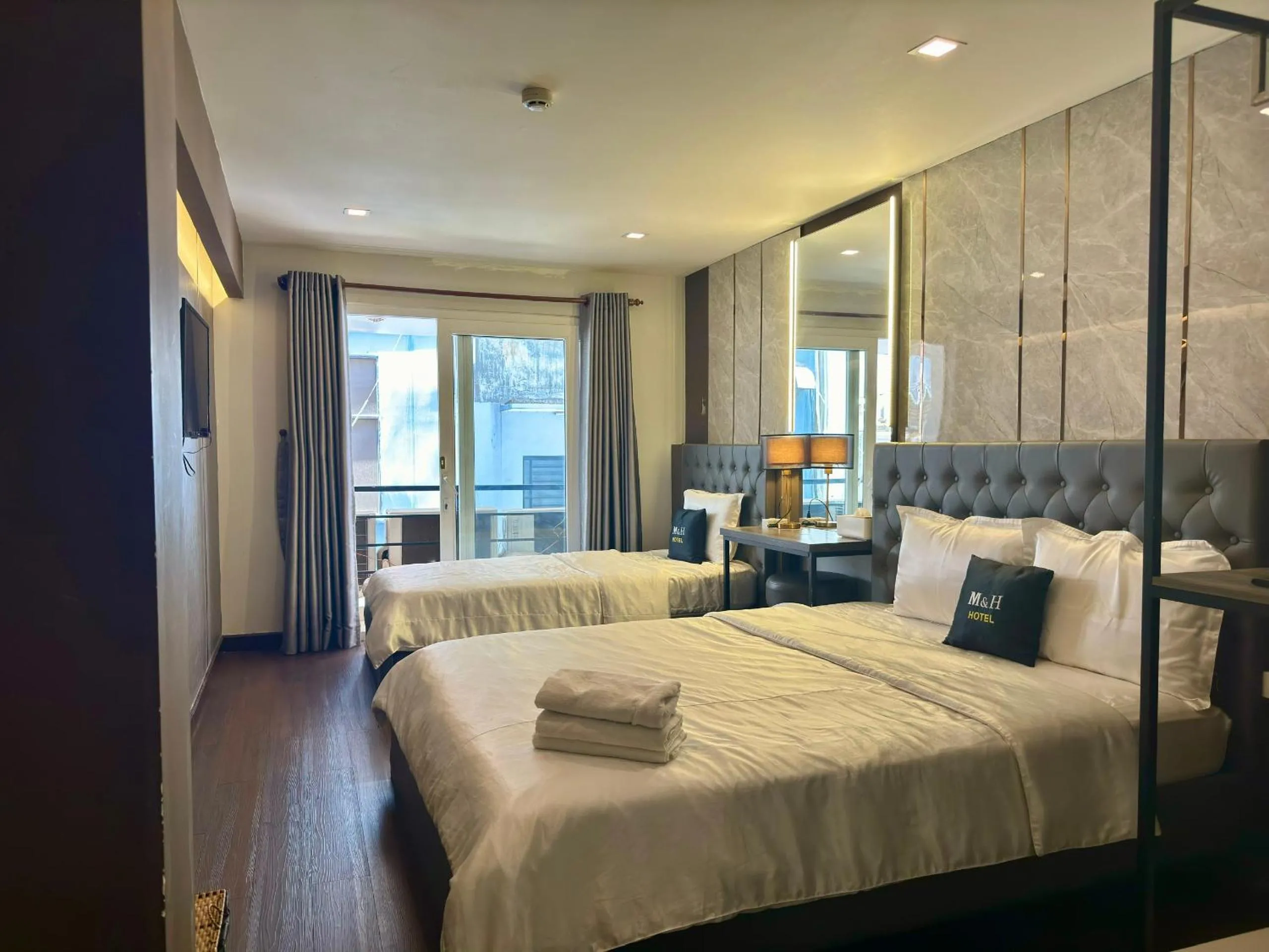 Photo of the whole room, Bed in M&H Lux Hotel