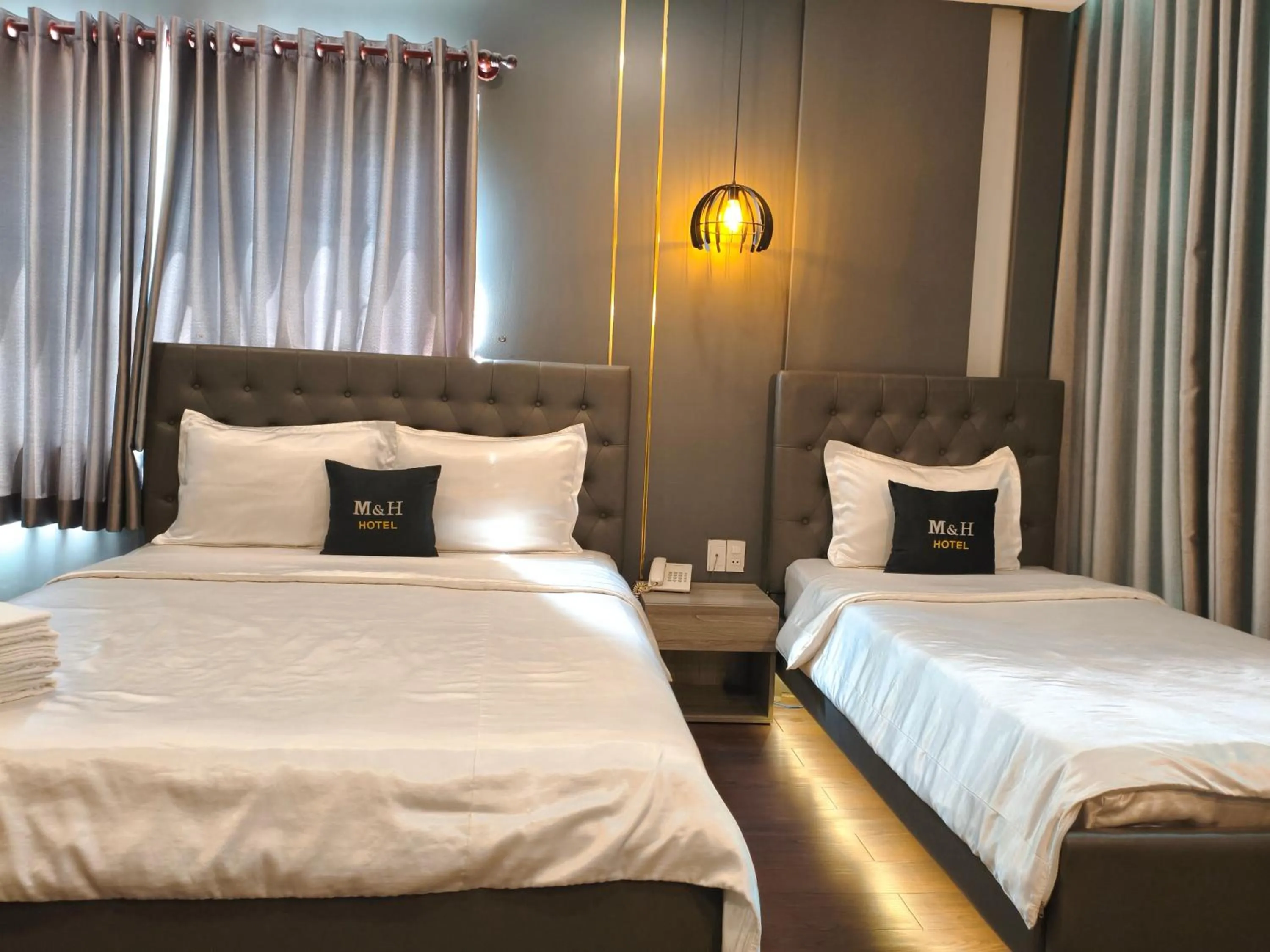 Photo of the whole room, Bed in M&H Lux Hotel