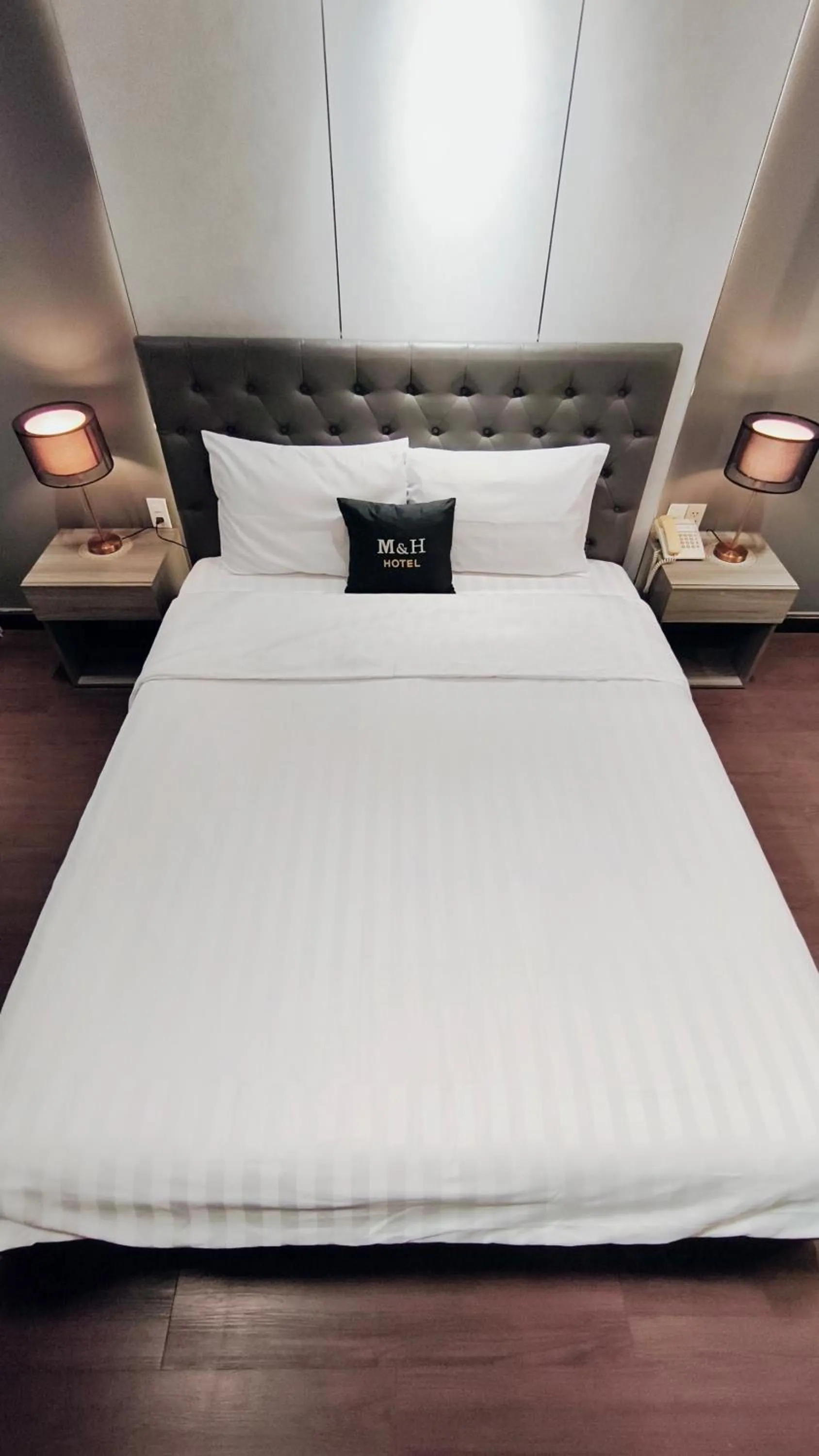 Bed in M&H Lux Hotel