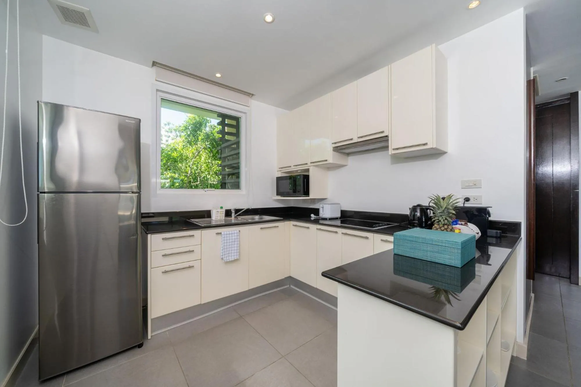 Kitchen or kitchenette in Karon Beachfront Apartment 724