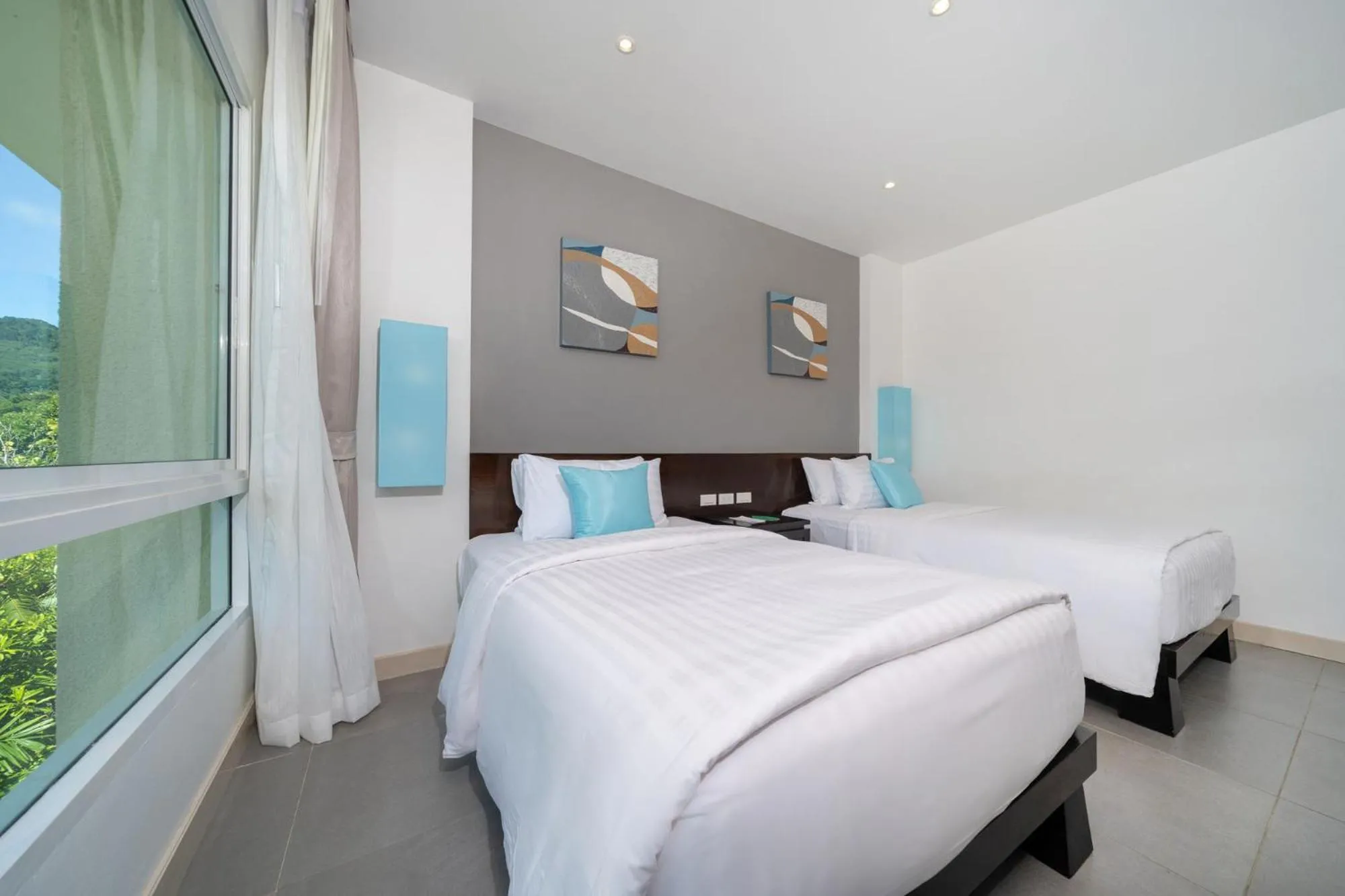 Bedroom, Bed in Karon Beachfront Apartment 724