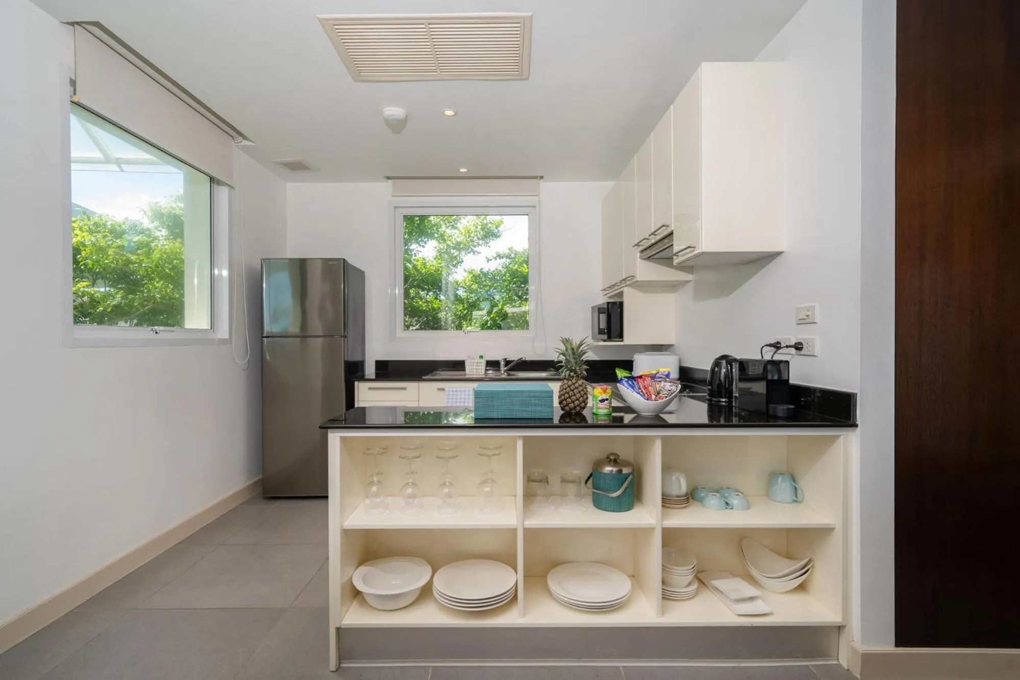 Kitchen or kitchenette in Karon Beachfront Apartment 724