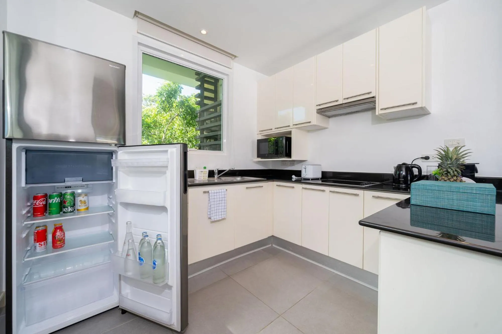 Kitchen or kitchenette in Karon Beachfront Apartment 724