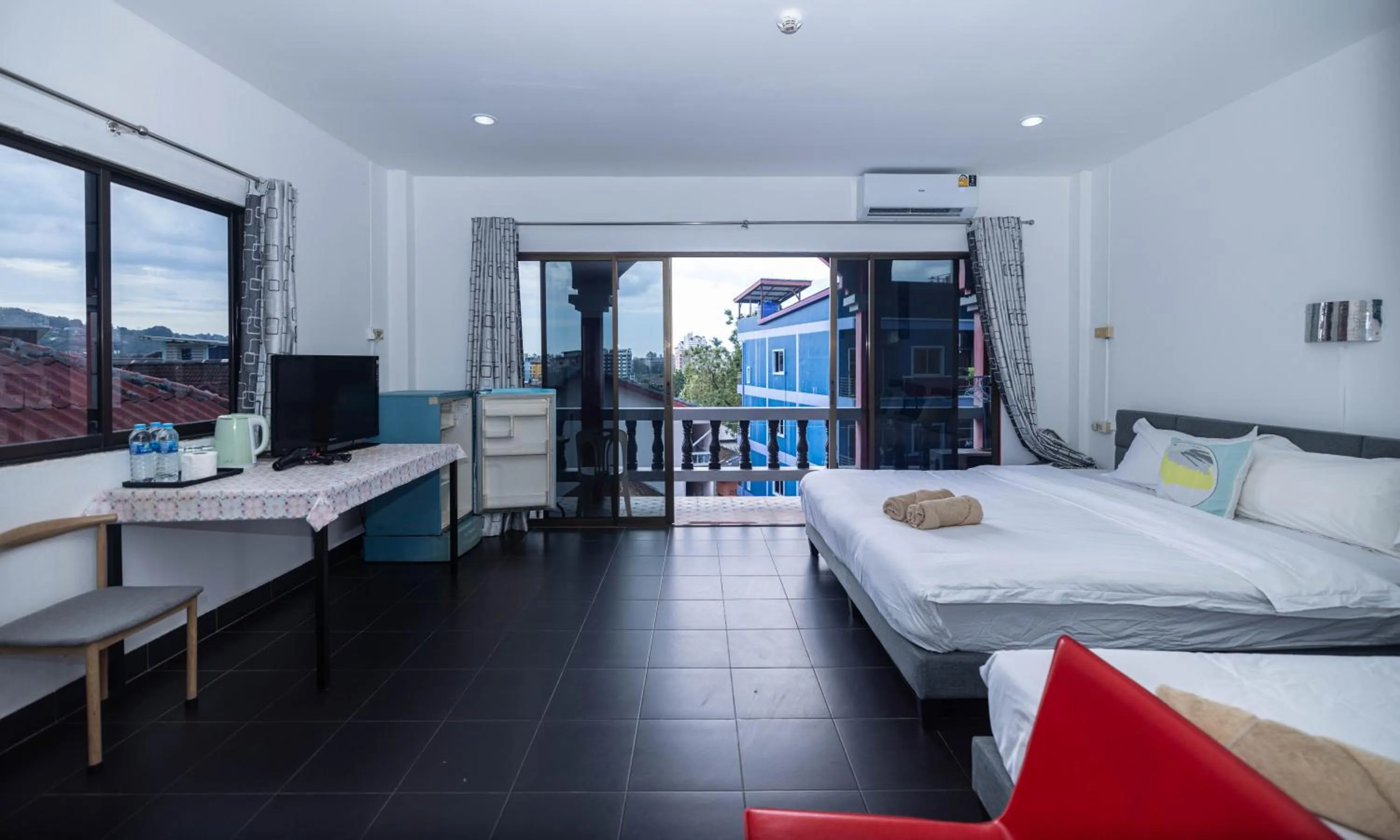 Bed in Belle Cose Guest House Phuket