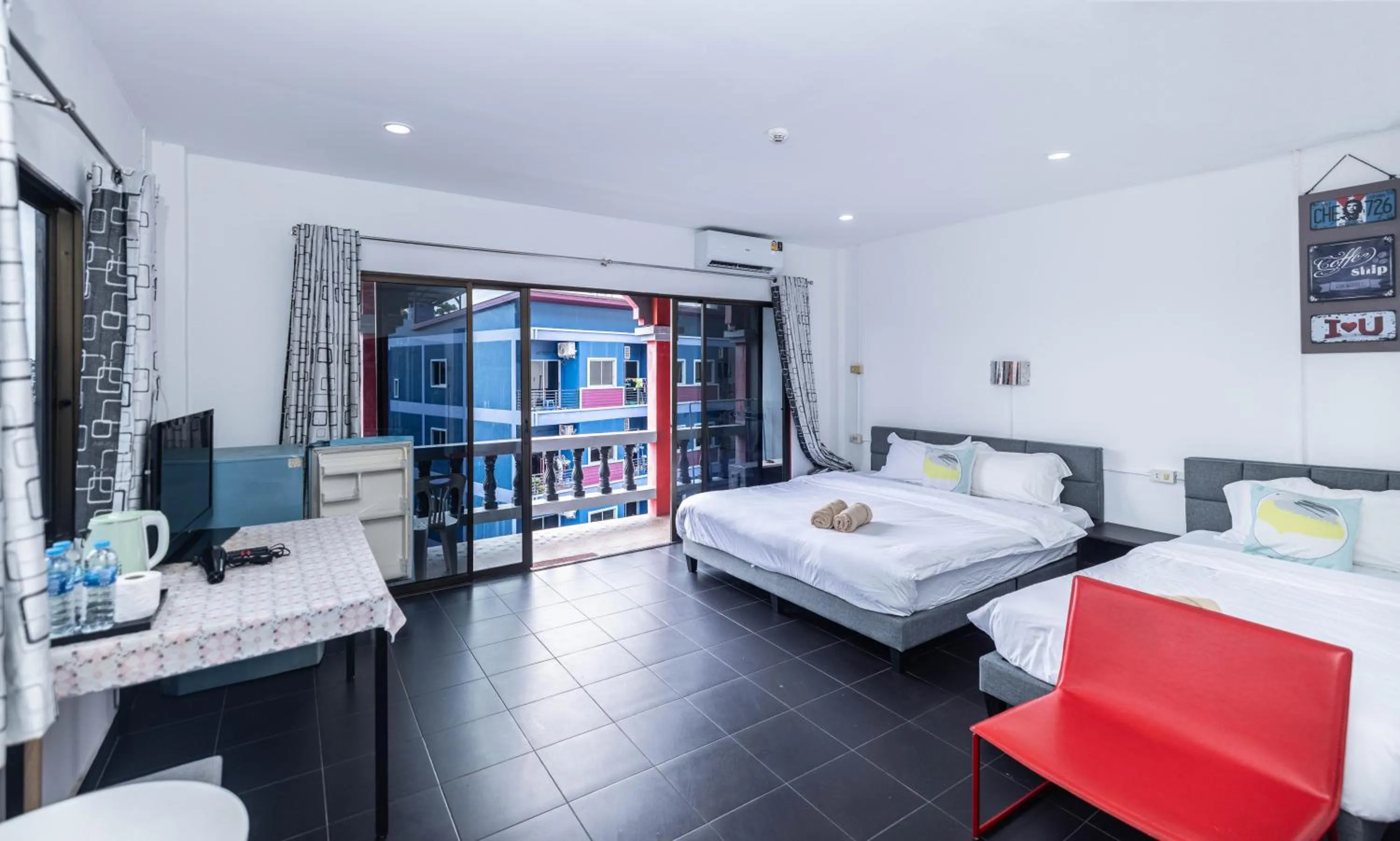 Bed in Belle Cose Guest House Phuket