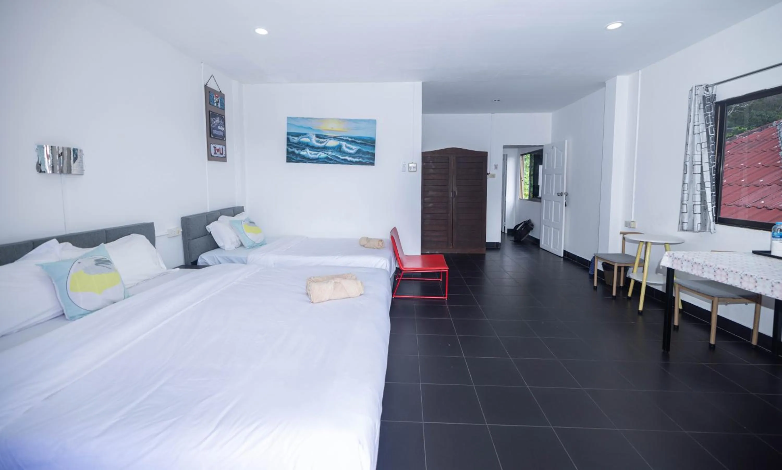 Bed in Belle Cose Guest House Phuket