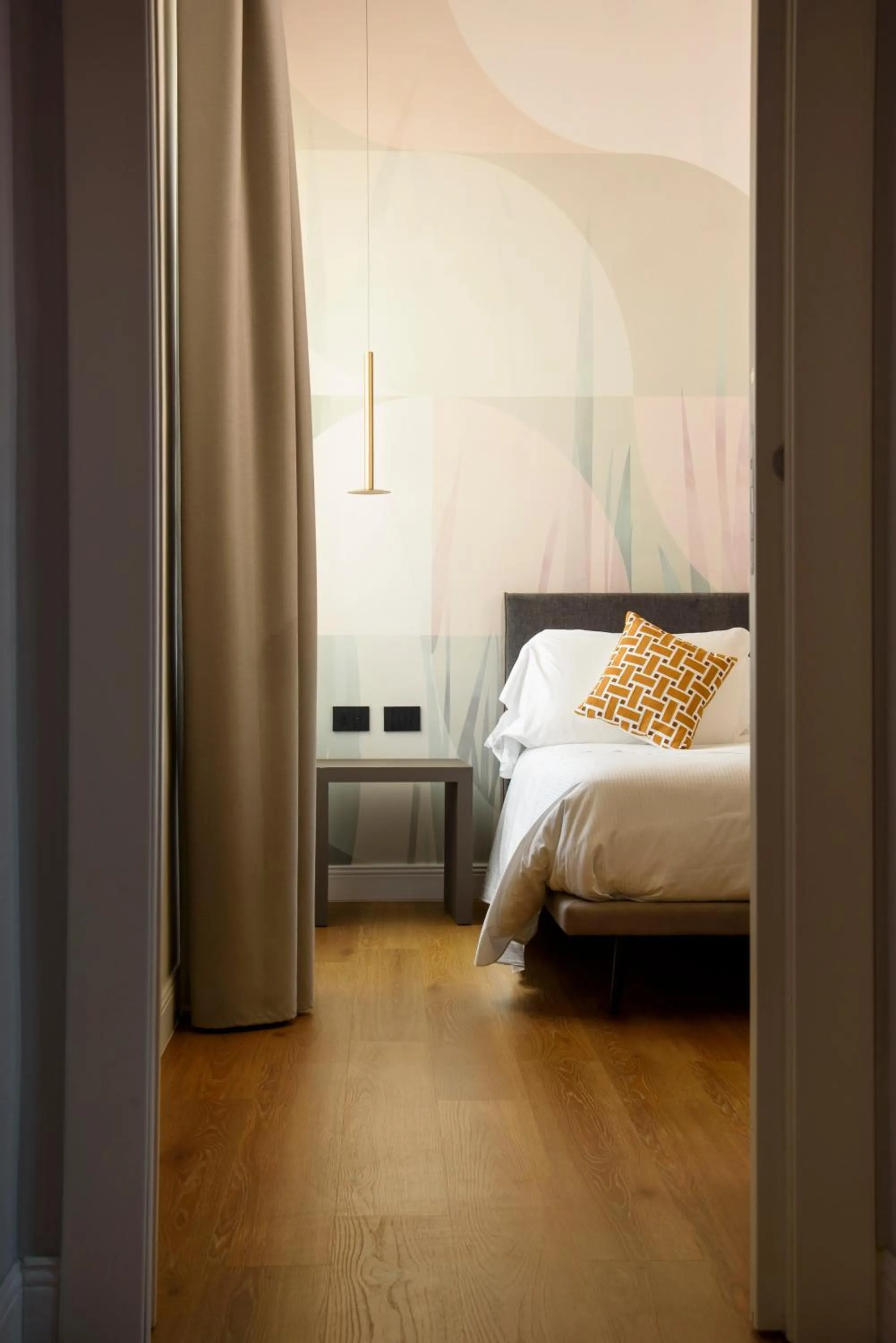 Bed in Vesuvius Palace Aparthotel