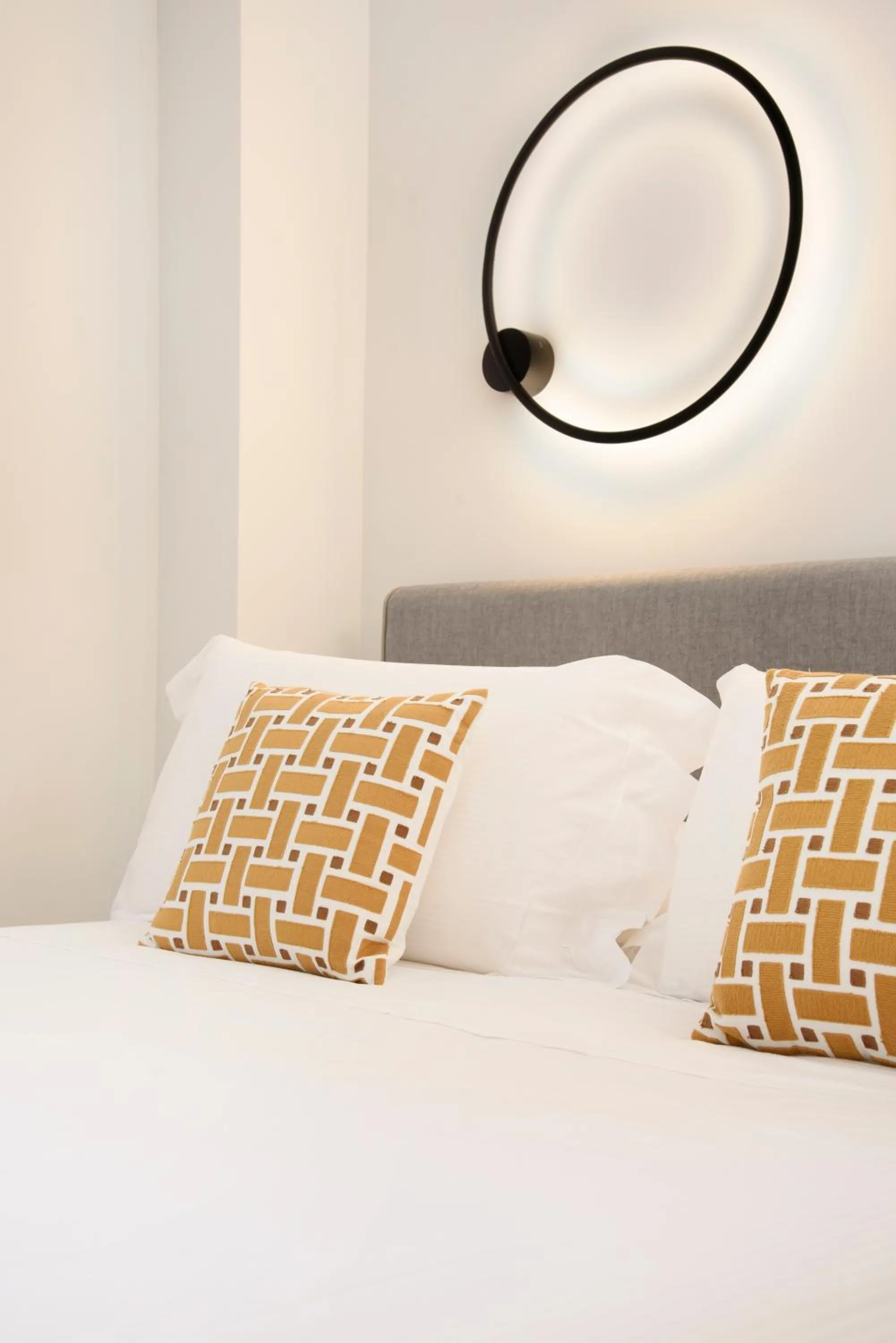 Bed in Vesuvius Palace Aparthotel