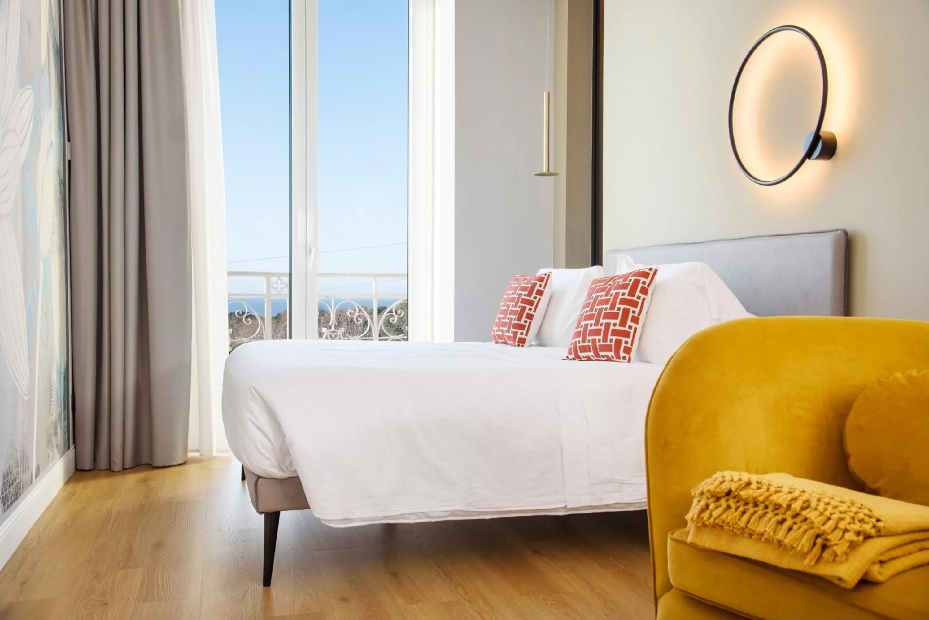 Bed in Vesuvius Palace Aparthotel