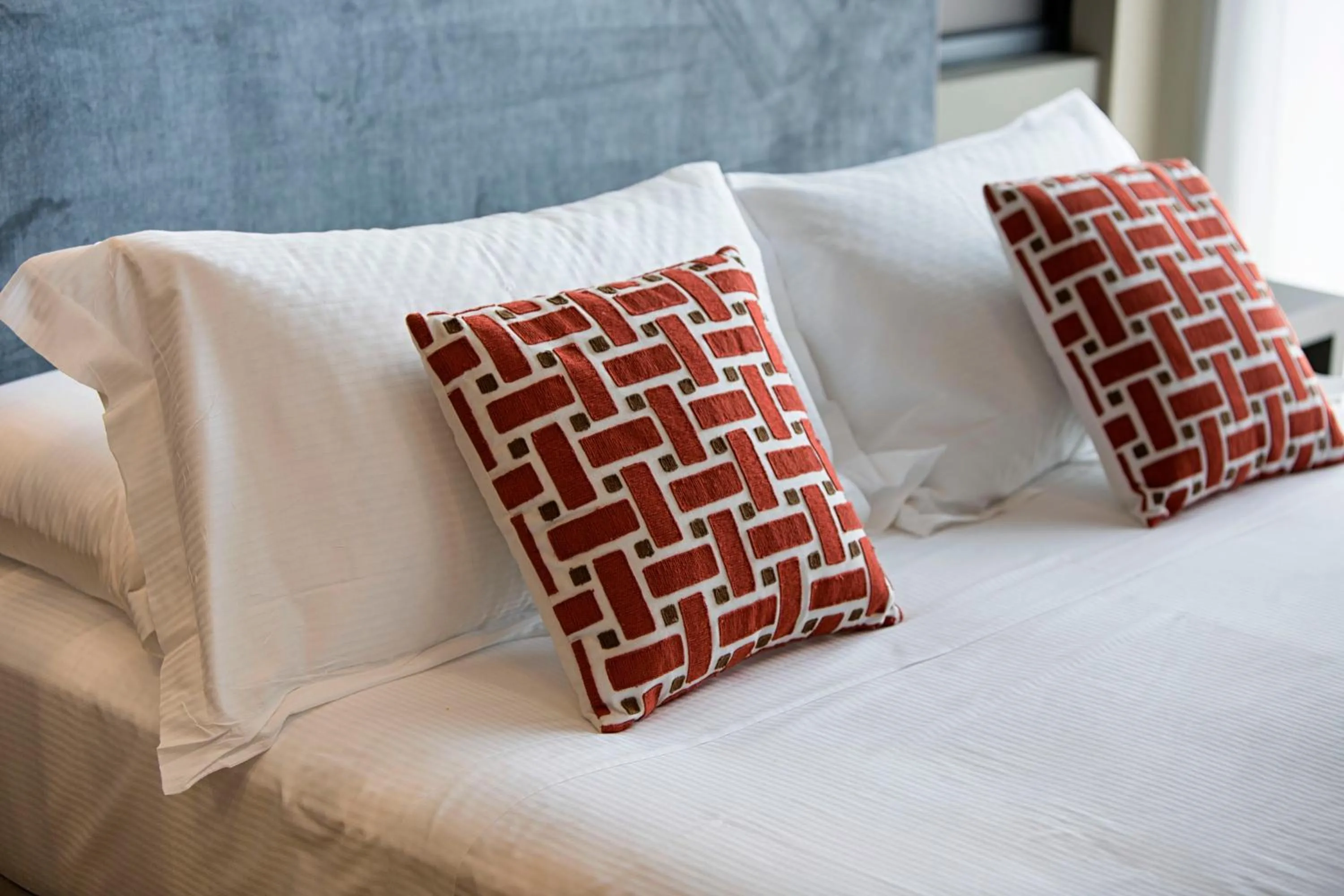 Bed in Vesuvius Palace Aparthotel