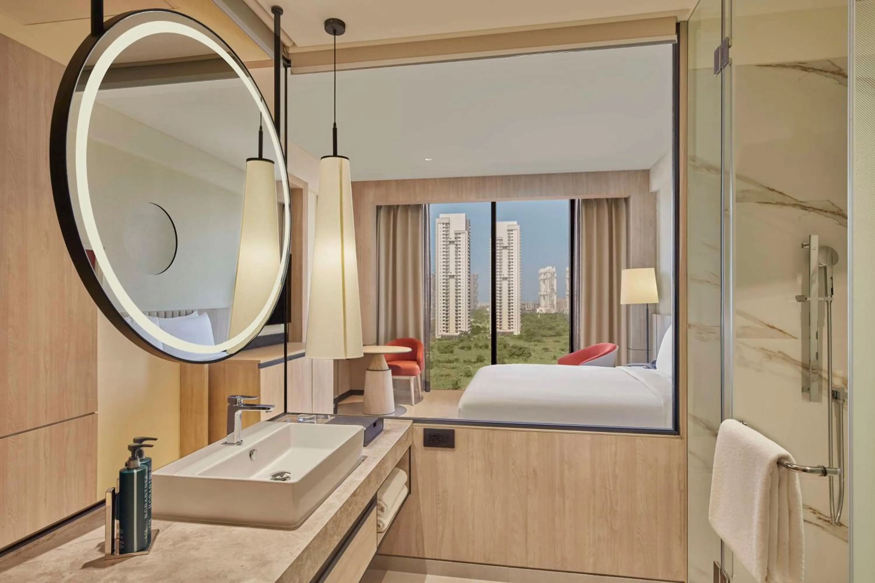 Bathroom, Bed in Hilton Gurugram Baani City Centre