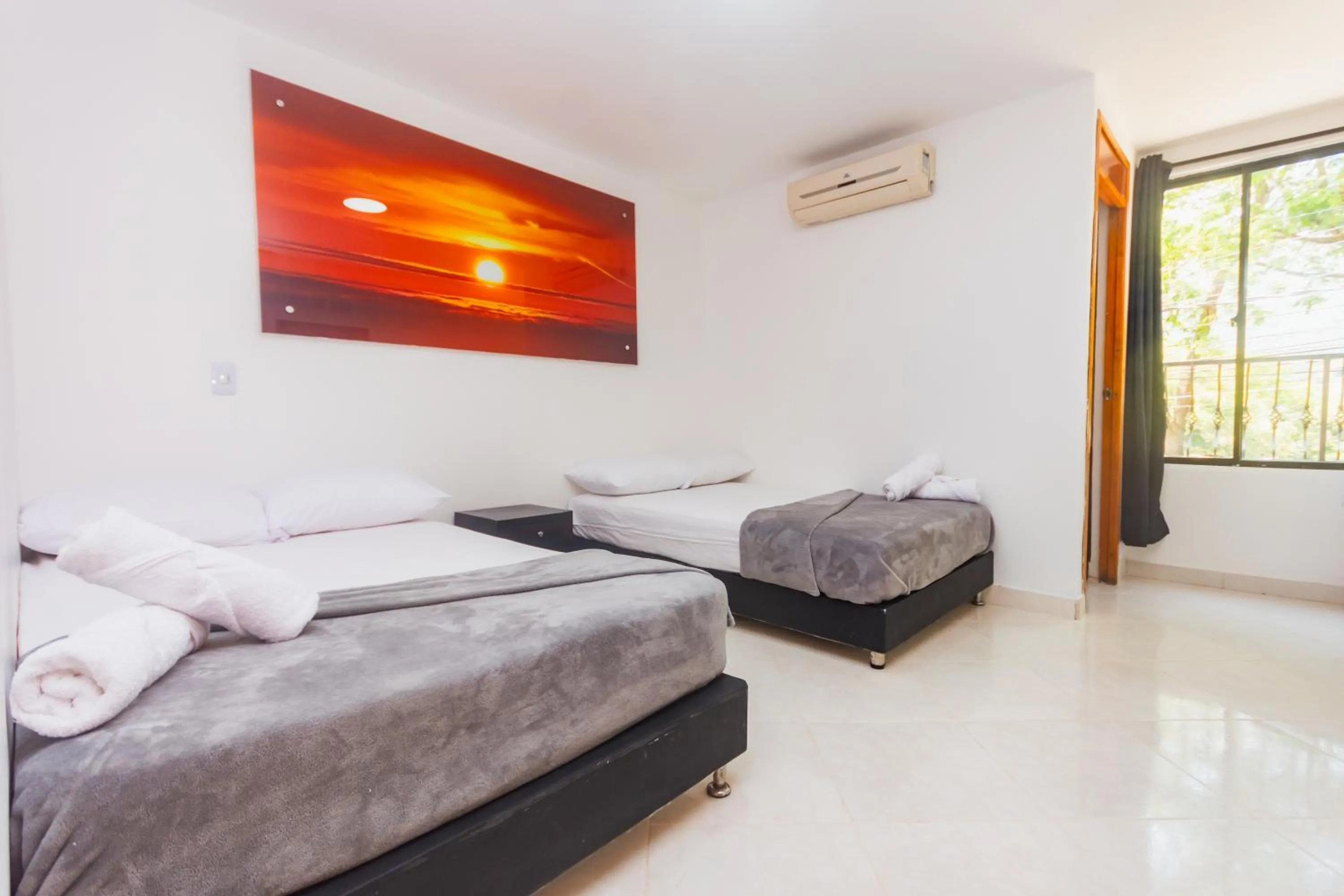 Bed in Hotel Tropical San Jeronimo