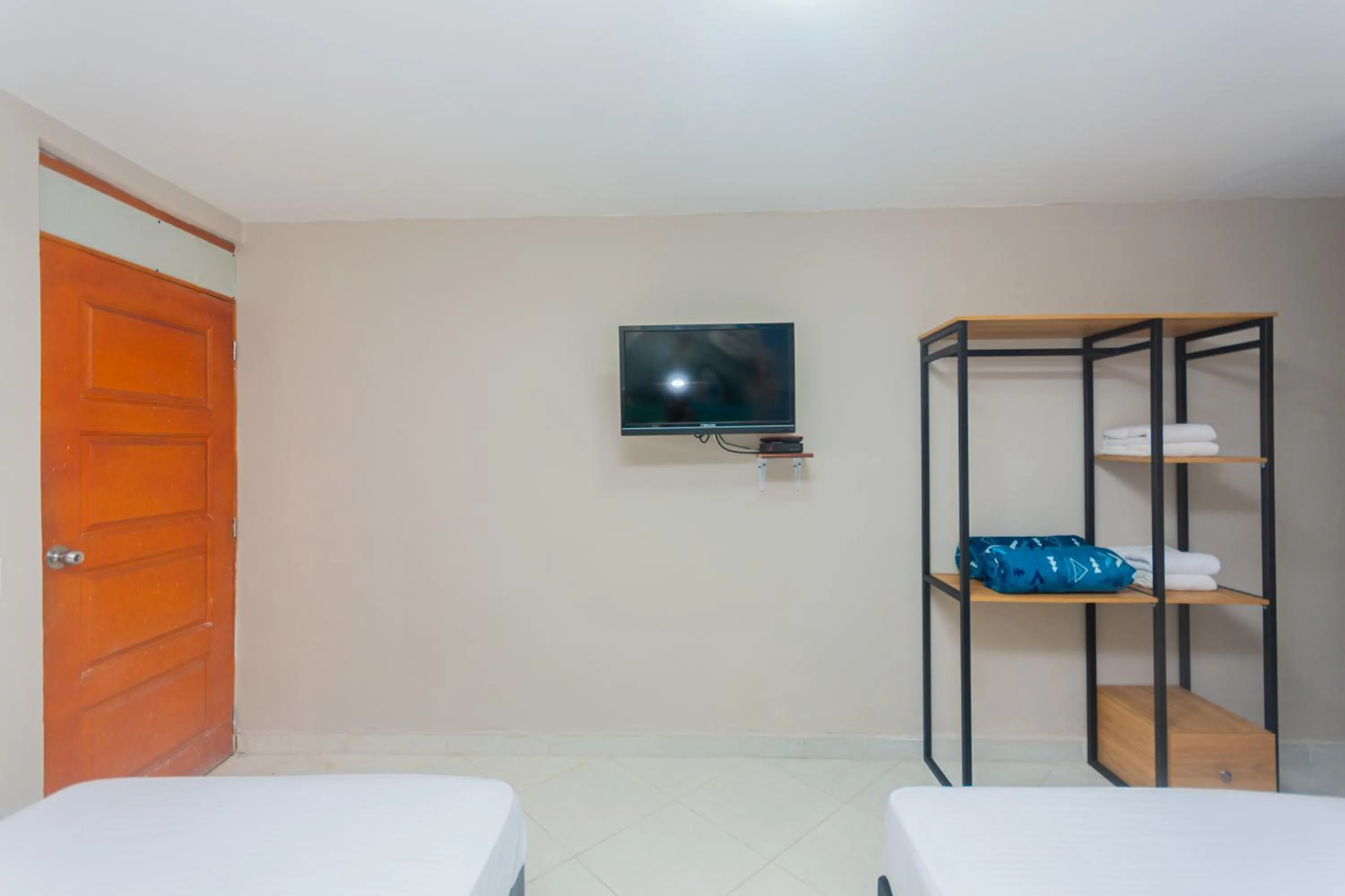 Bed in Hotel Tropical San Jeronimo