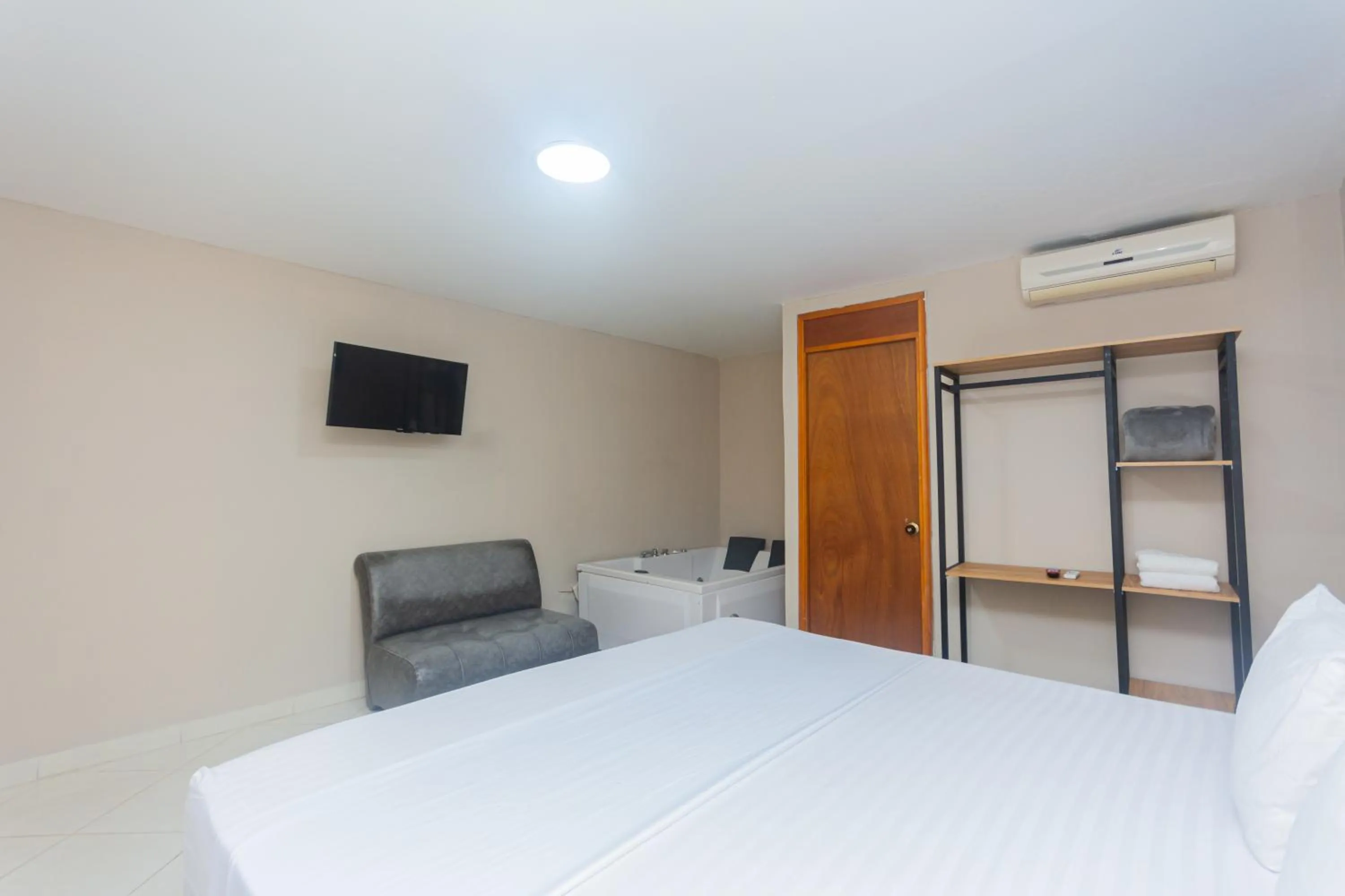 Bed in Hotel Tropical San Jeronimo