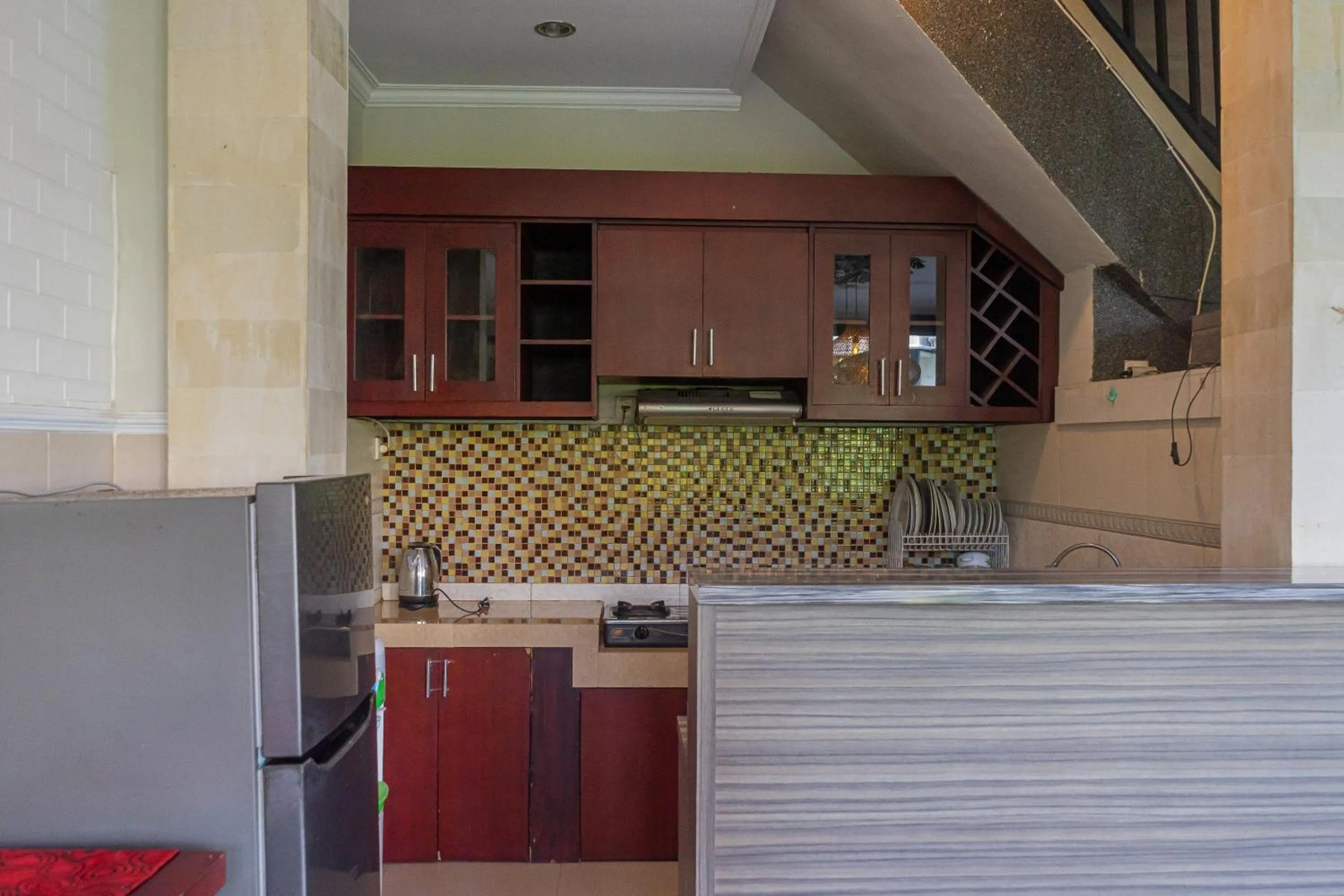Kitchen or kitchenette in Griya Shanti Homestay