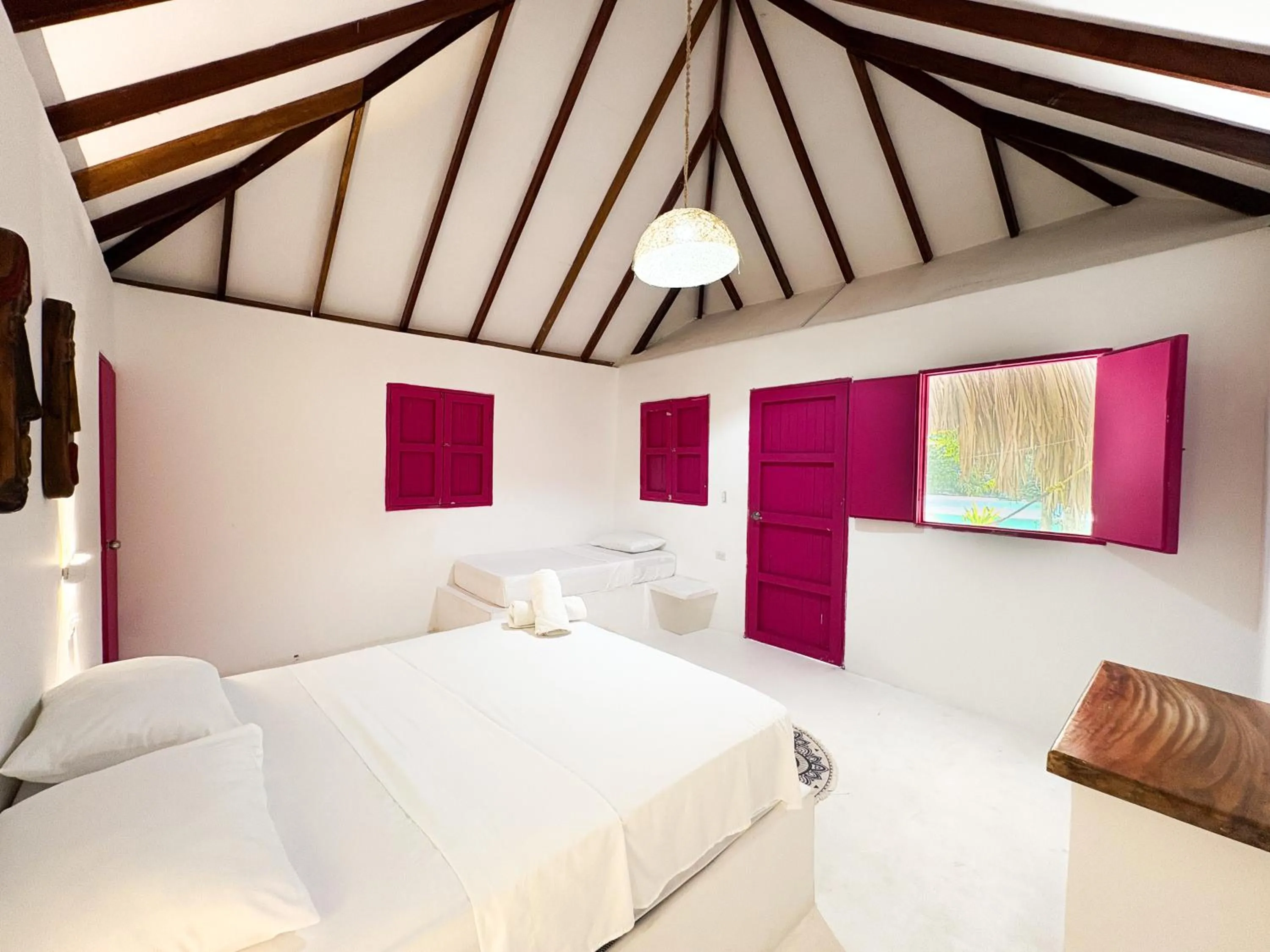 Photo of the whole room, Bed in Hotel Coral Sand Islas Del Rosario