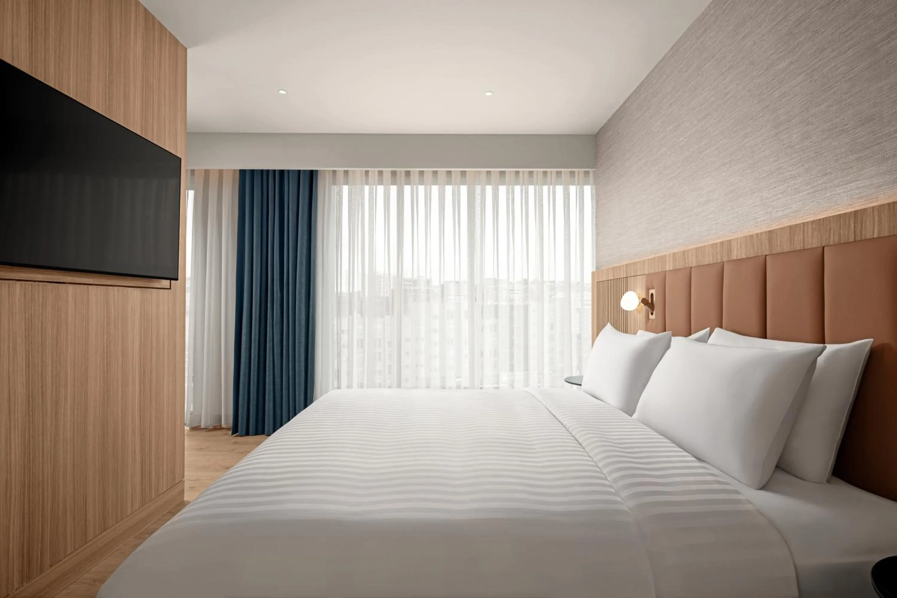 Bed in Courtyard by Marriott Prishtina