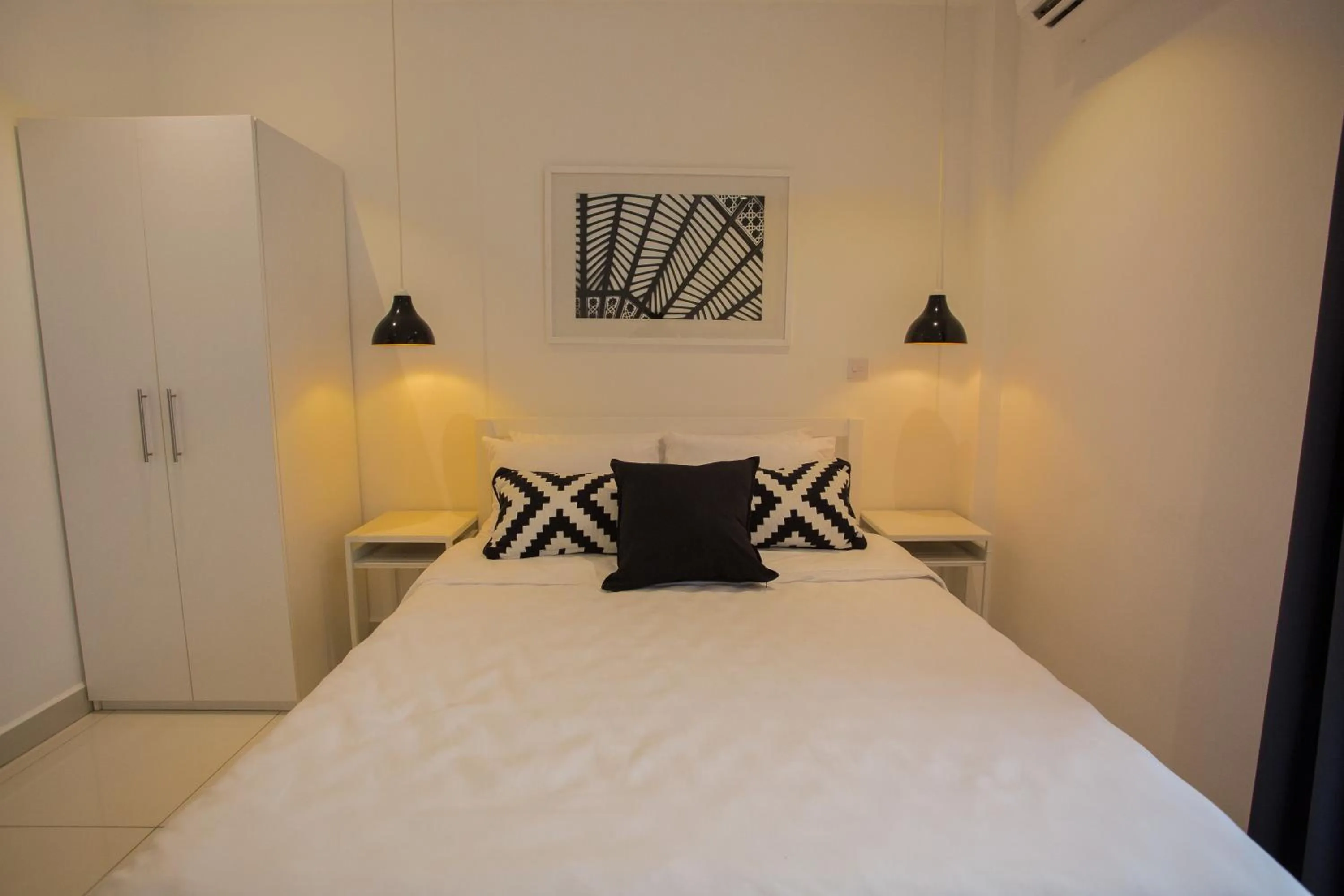 Bedroom, Bed in Accra Luxury Apartments at Embassy Gardens
