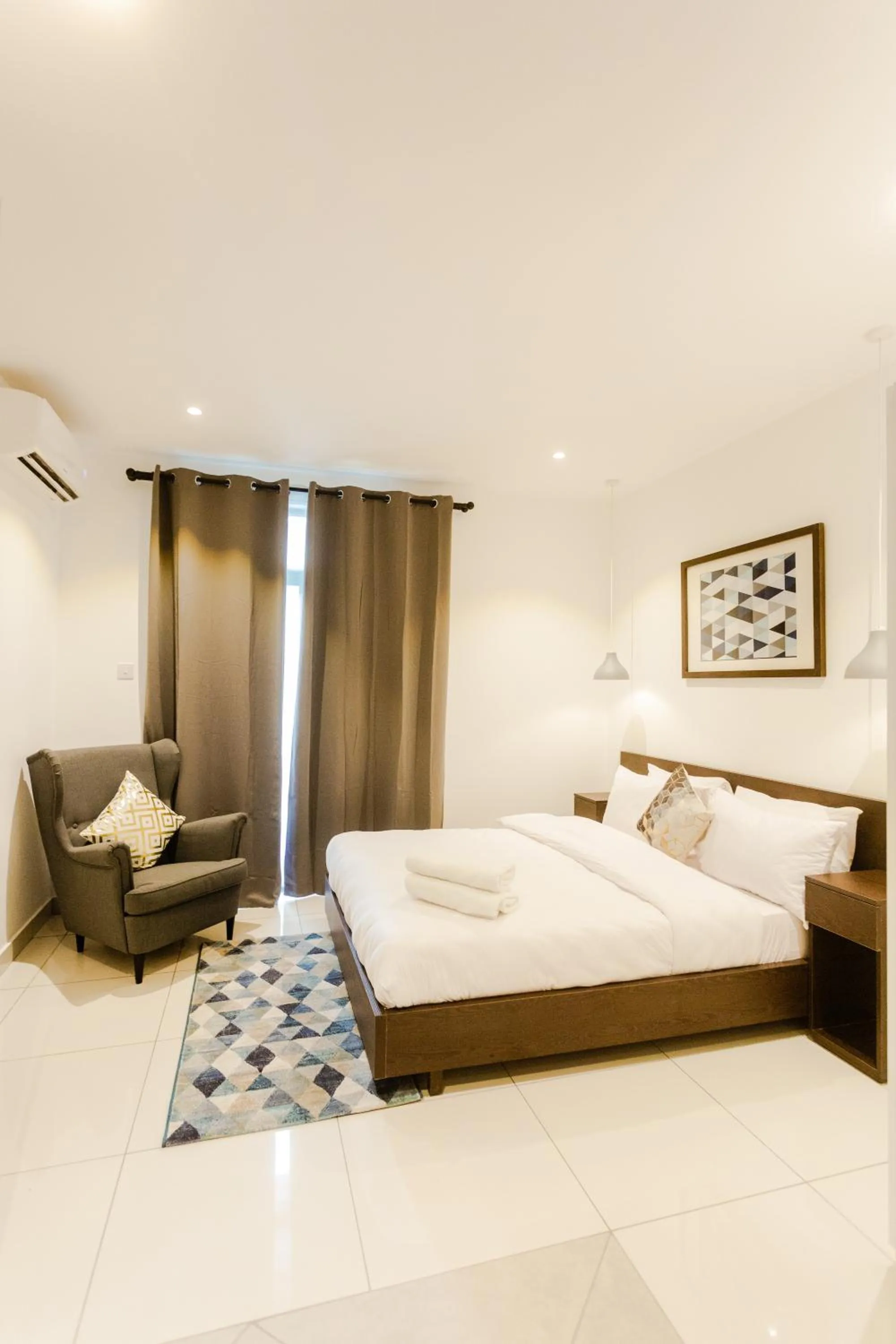 Bed in Accra Luxury Apartments at Embassy Gardens