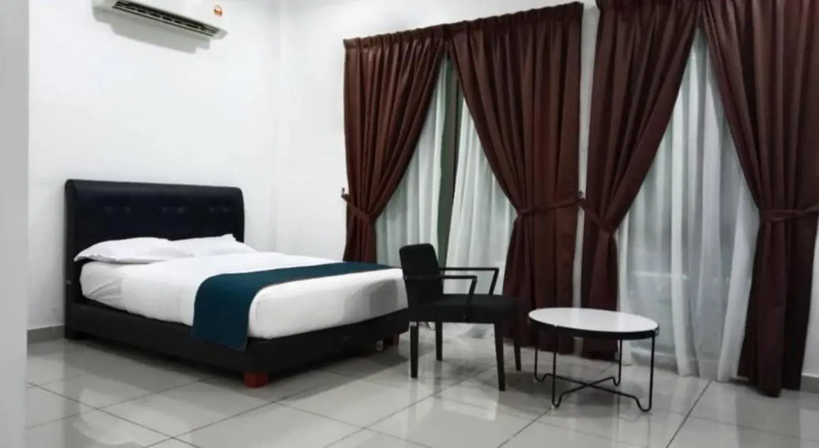 Bed in AK Cvia Hotel Bed in AK Cvia Hotel