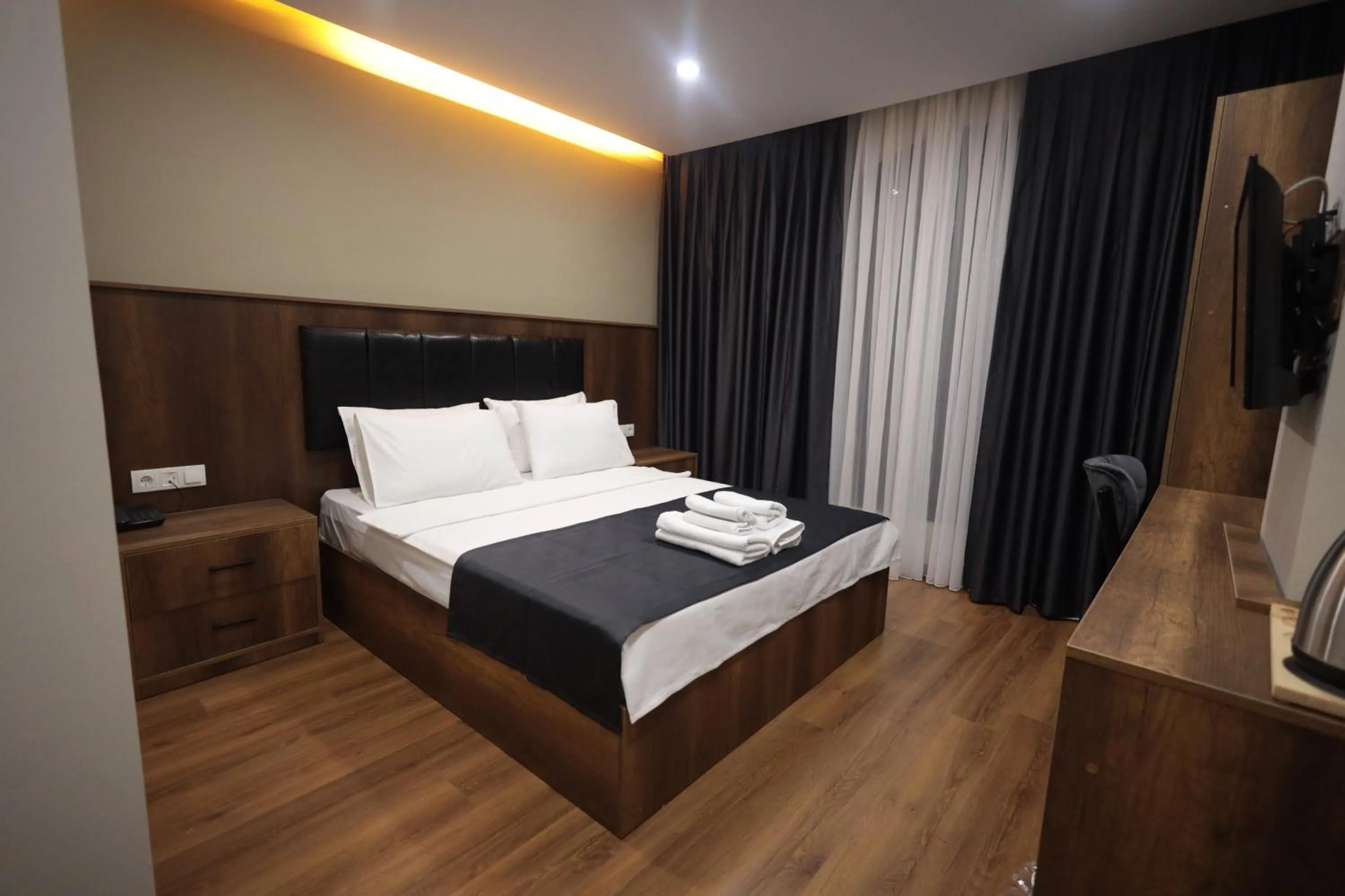 Photo of the whole room, Bed in BZN Airport Hotel