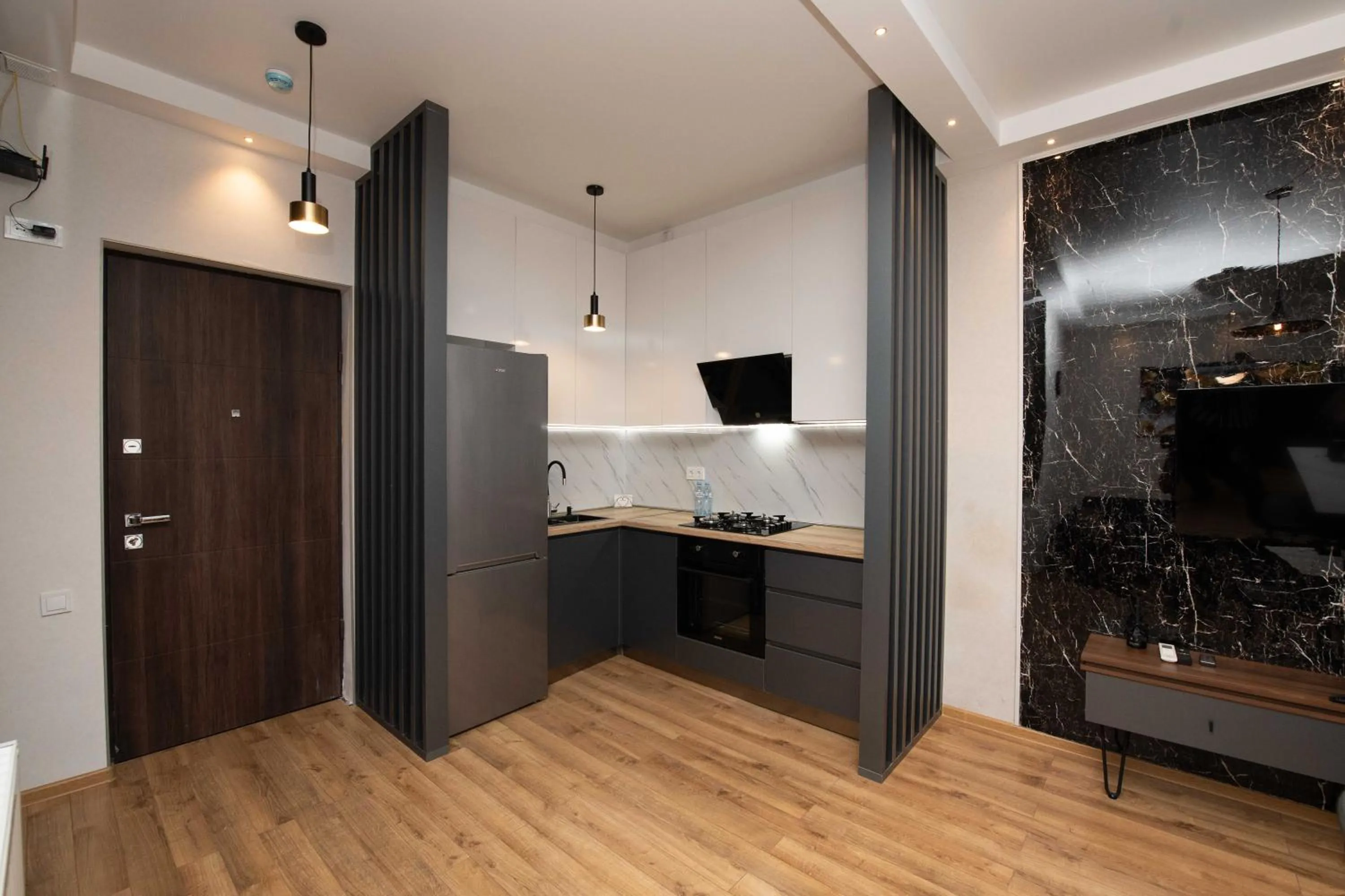 Kitchen or kitchenette in Gori Palace - Modern Apartments in City Centre