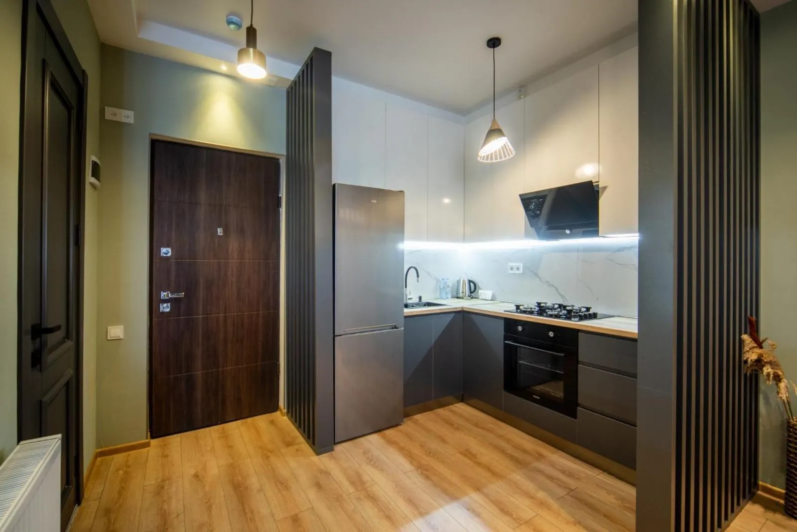 Kitchen or kitchenette in Gori Palace - Modern Apartments in City Centre