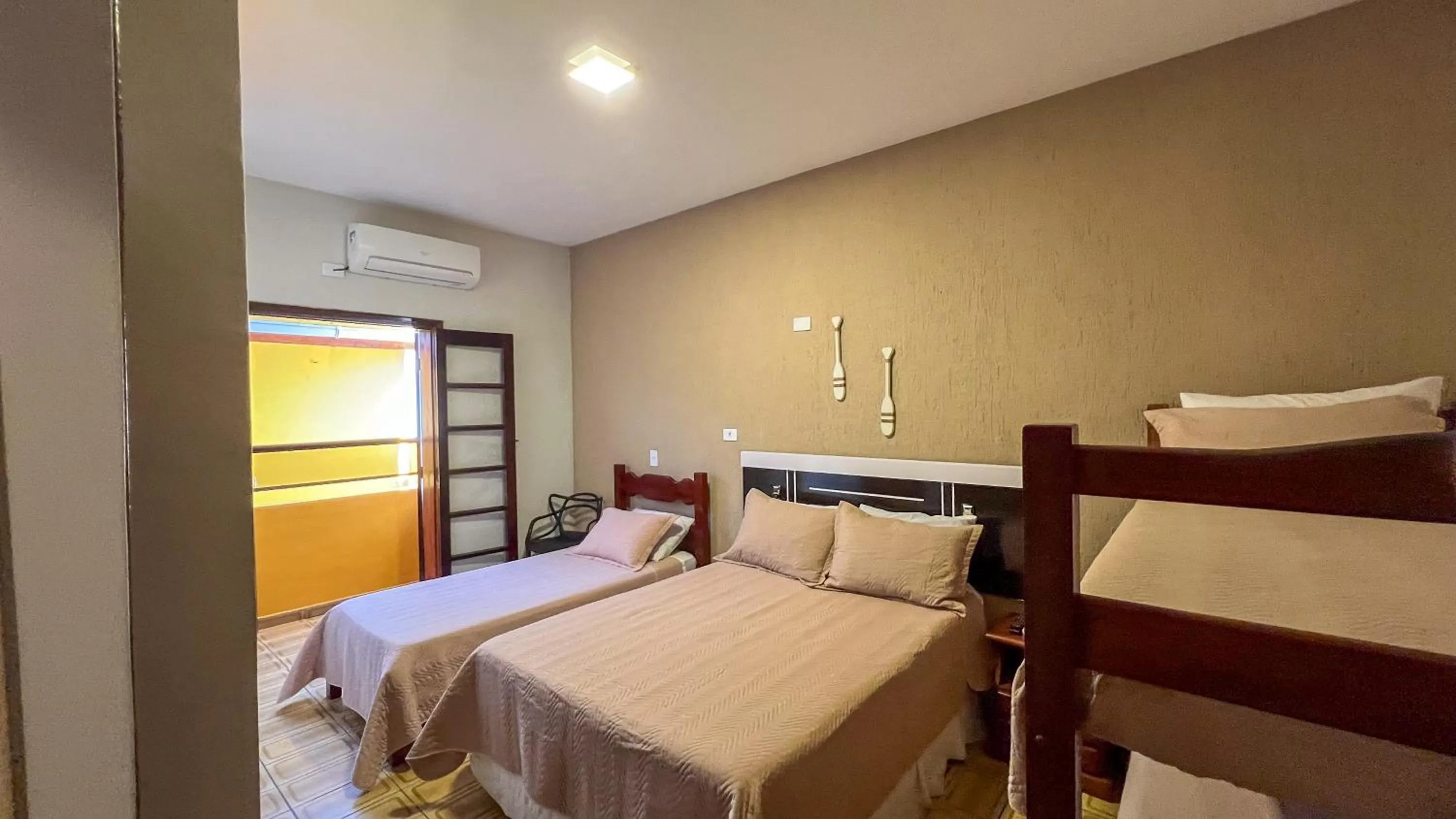 Bed in Pousada Amanhecer do Itaguá