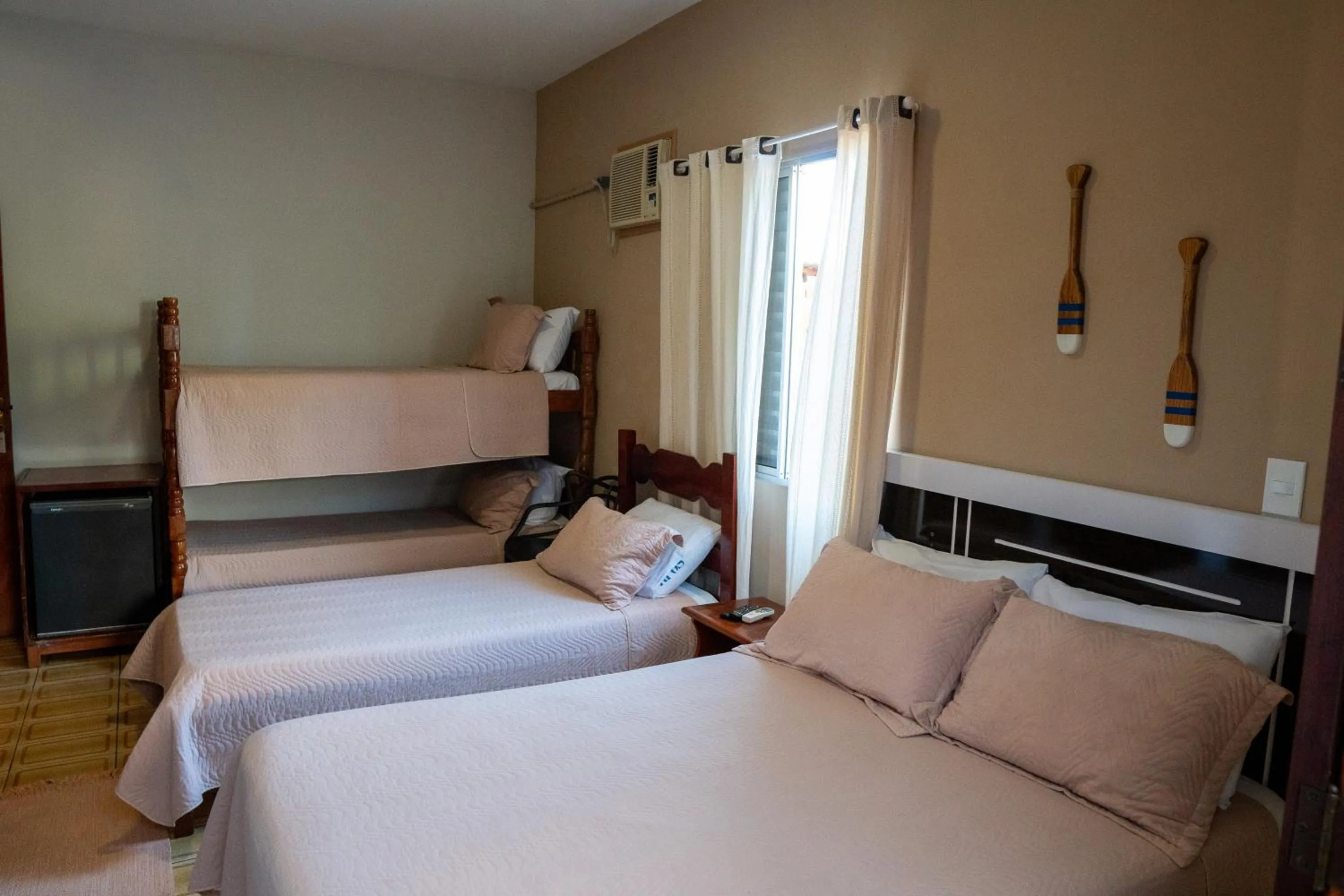 Bed in Pousada Amanhecer do Itaguá