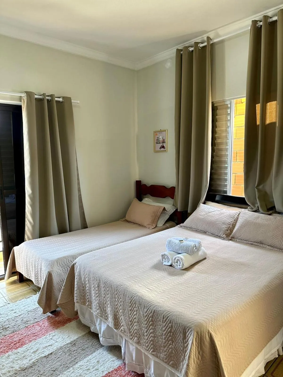 Bed in Pousada Amanhecer do Itaguá