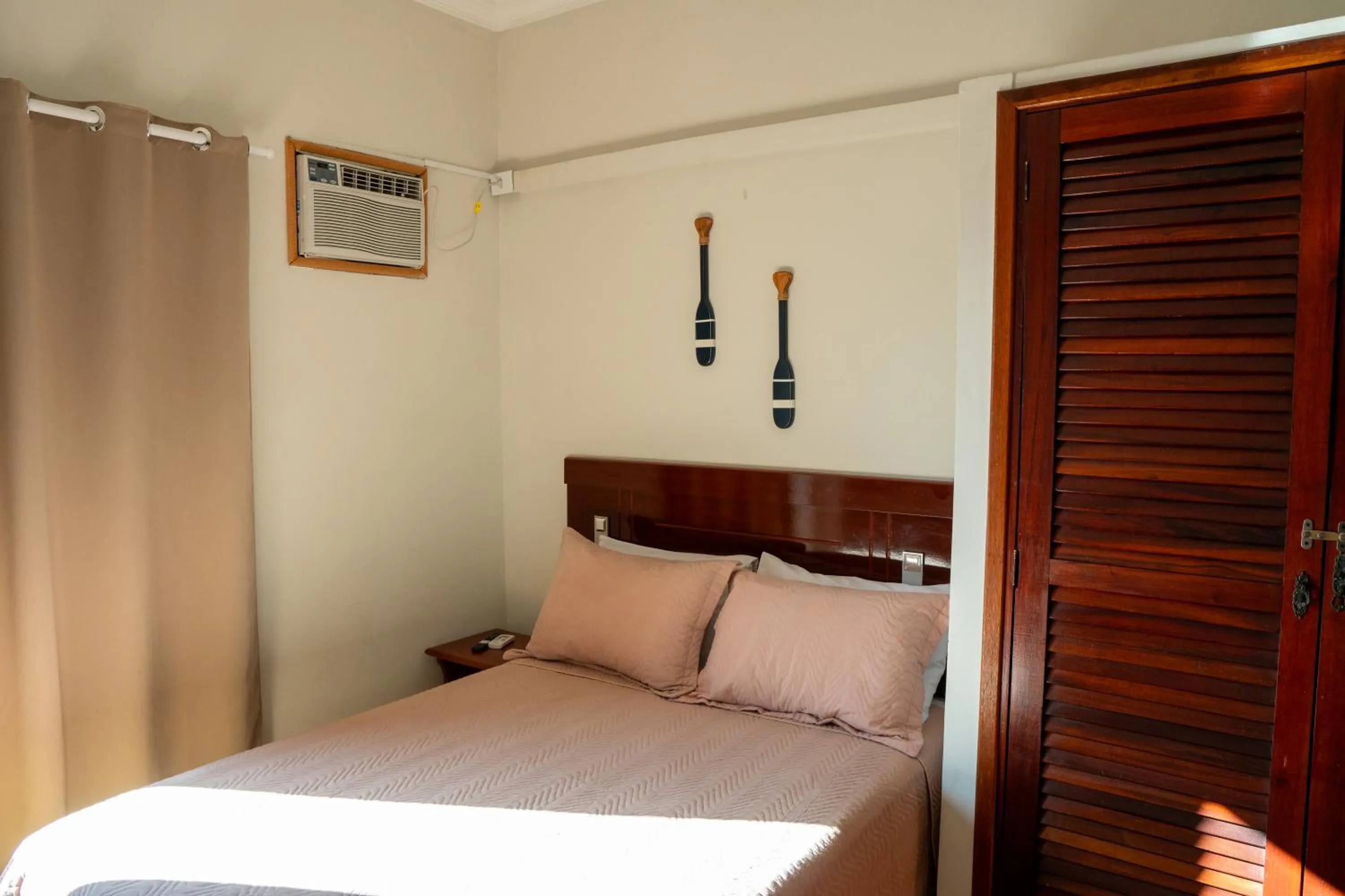 Bed in Pousada Amanhecer do Itaguá