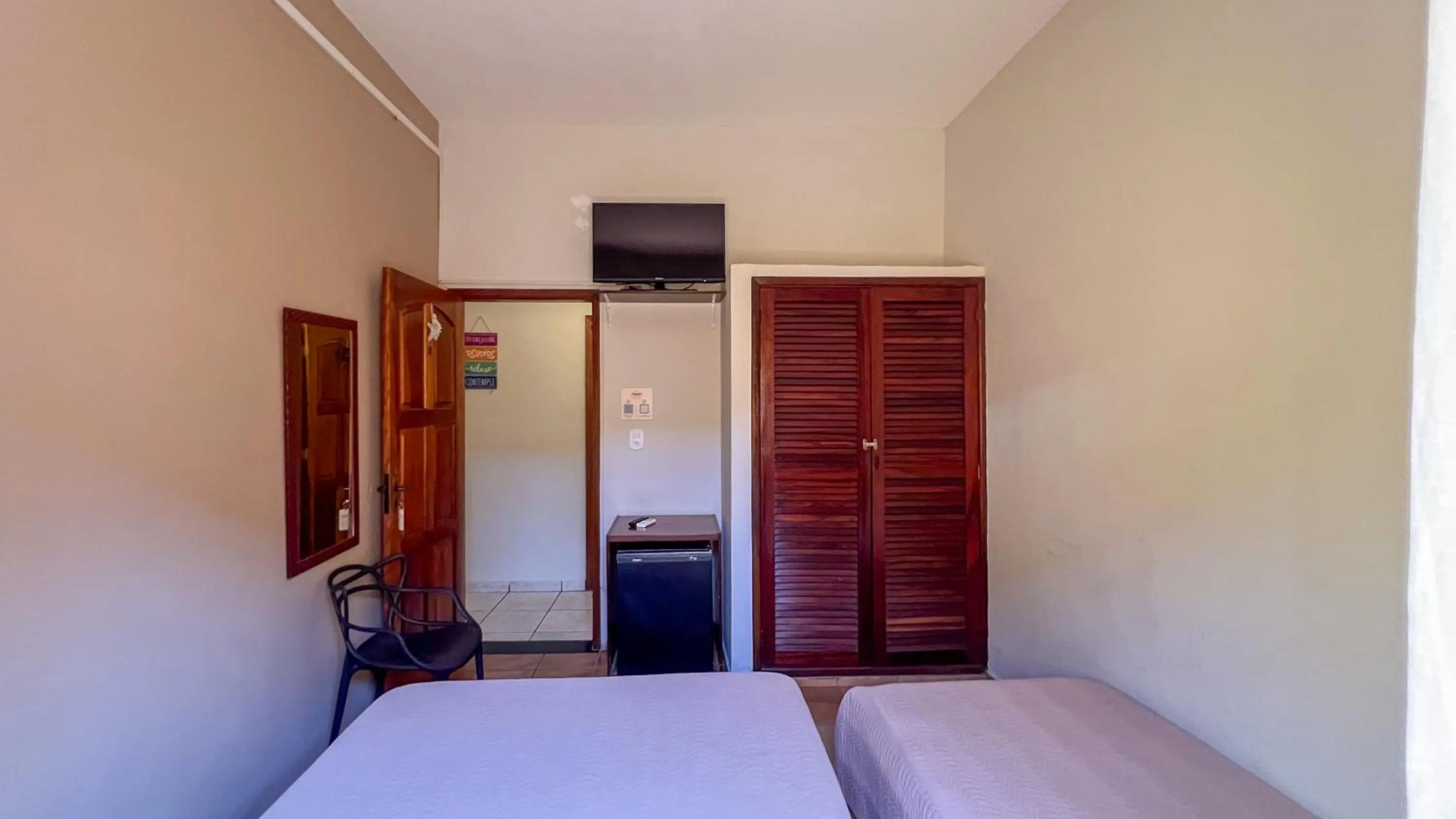 TV and multimedia in Pousada Amanhecer do Itaguá