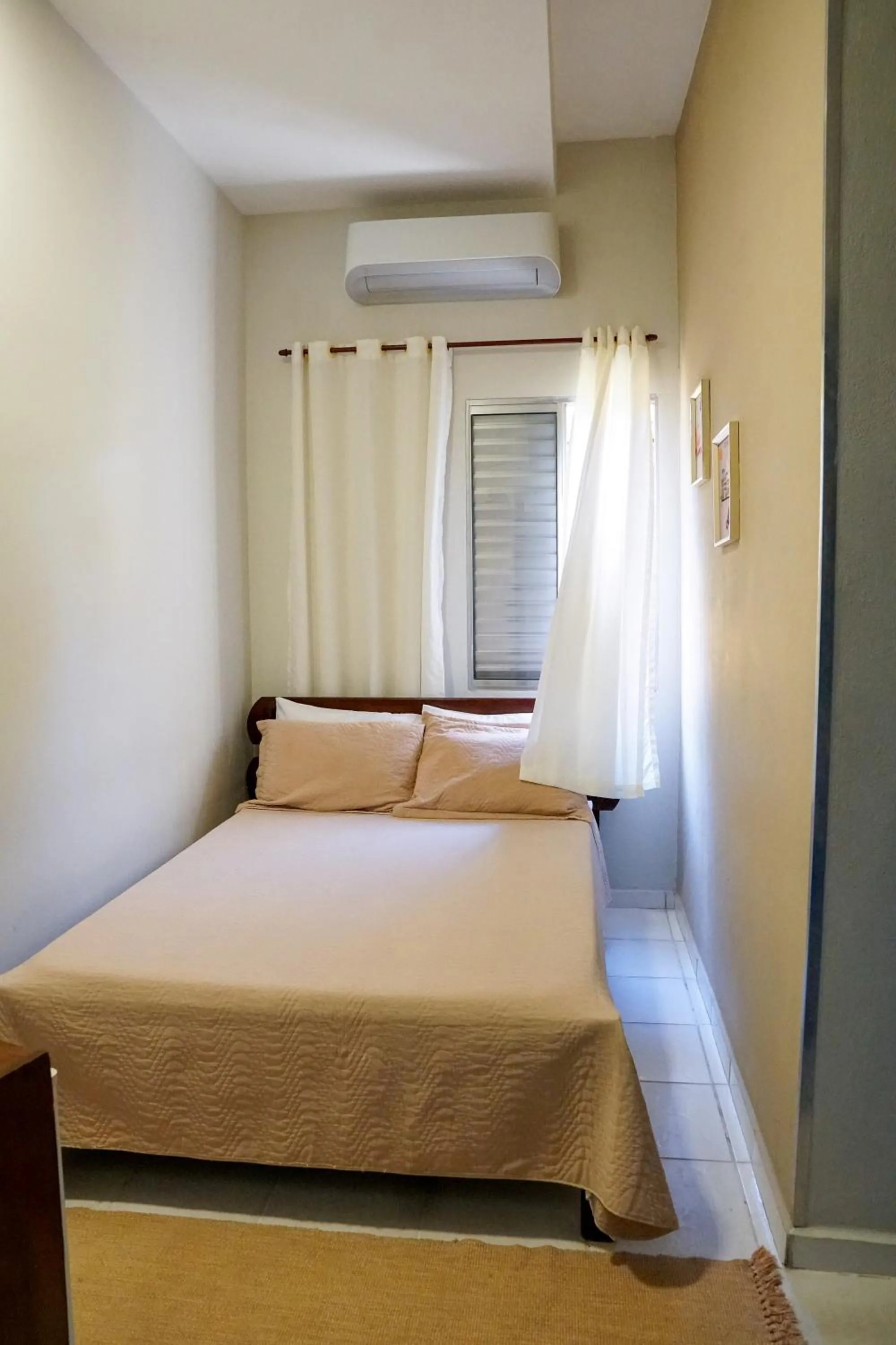 Bed in Pousada Amanhecer do Itaguá